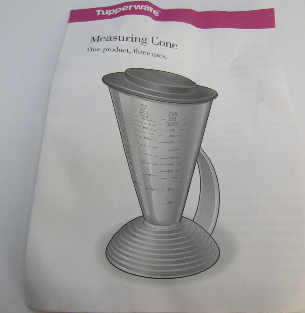 Brand New Tupperware Blue Lidded Measuring Cone.