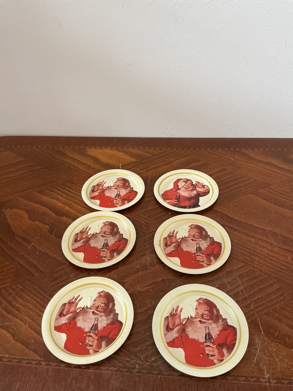 6-vintage Coca-Cola Santa Claus metal coasters from the early 1980s 6-vintage Coca-Cola Santa Claus metal coasters from the early 1980s
