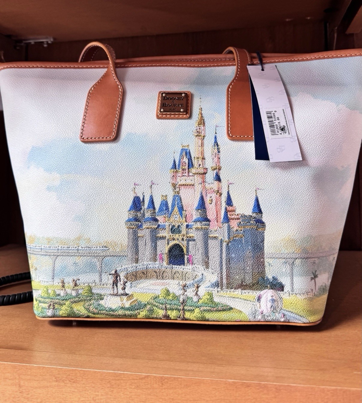 2026 Walt Disney World 55th Anniversary Dooney & Bourke Castle Tote Bag In Hand 2026 Walt Disney World 55th Anniversary Dooney & Bourke Castle Tote Bag In Hand