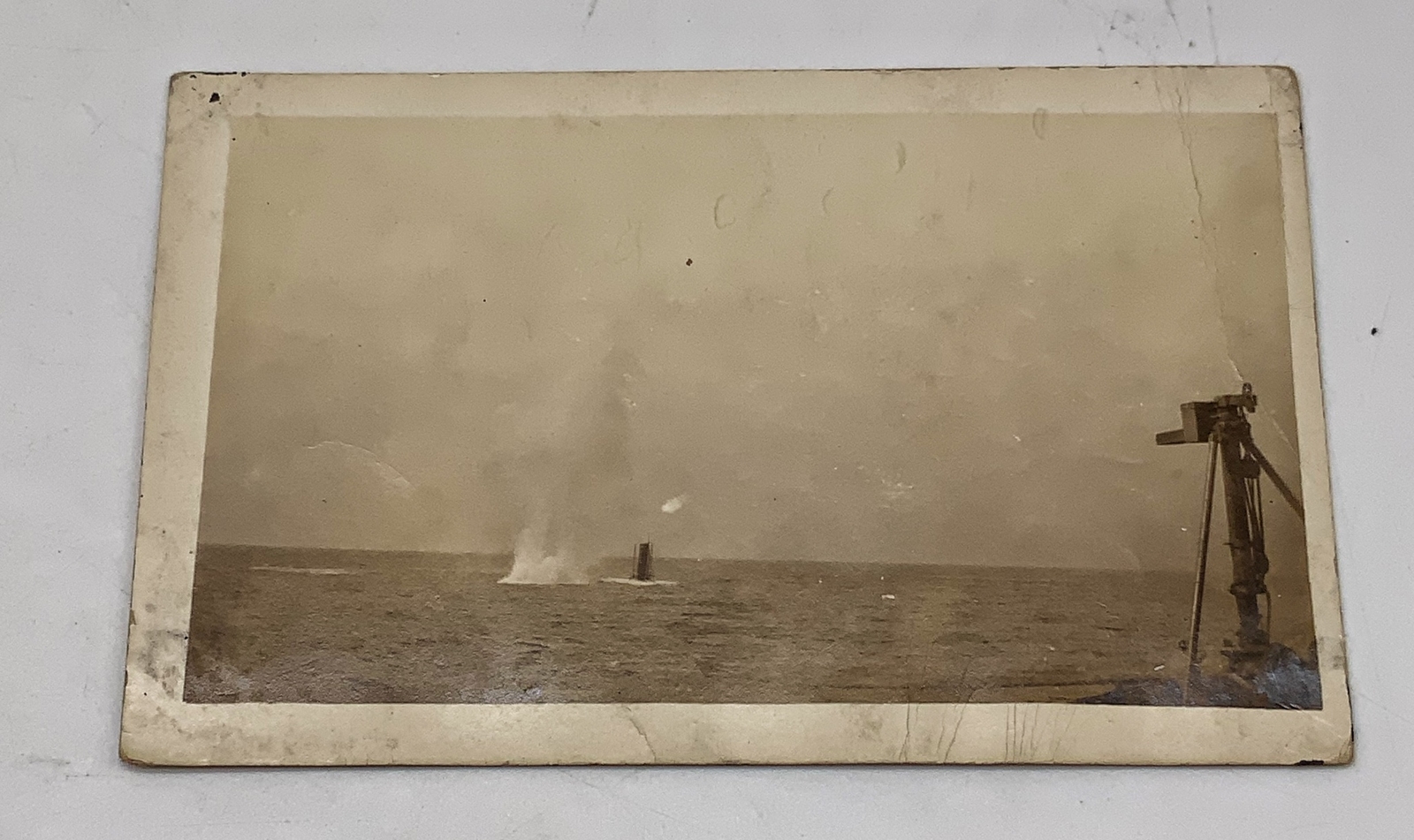 WWI RPPC Photo postcard U.S.S. Dakota firing at submarine BY Jones & Pruitt