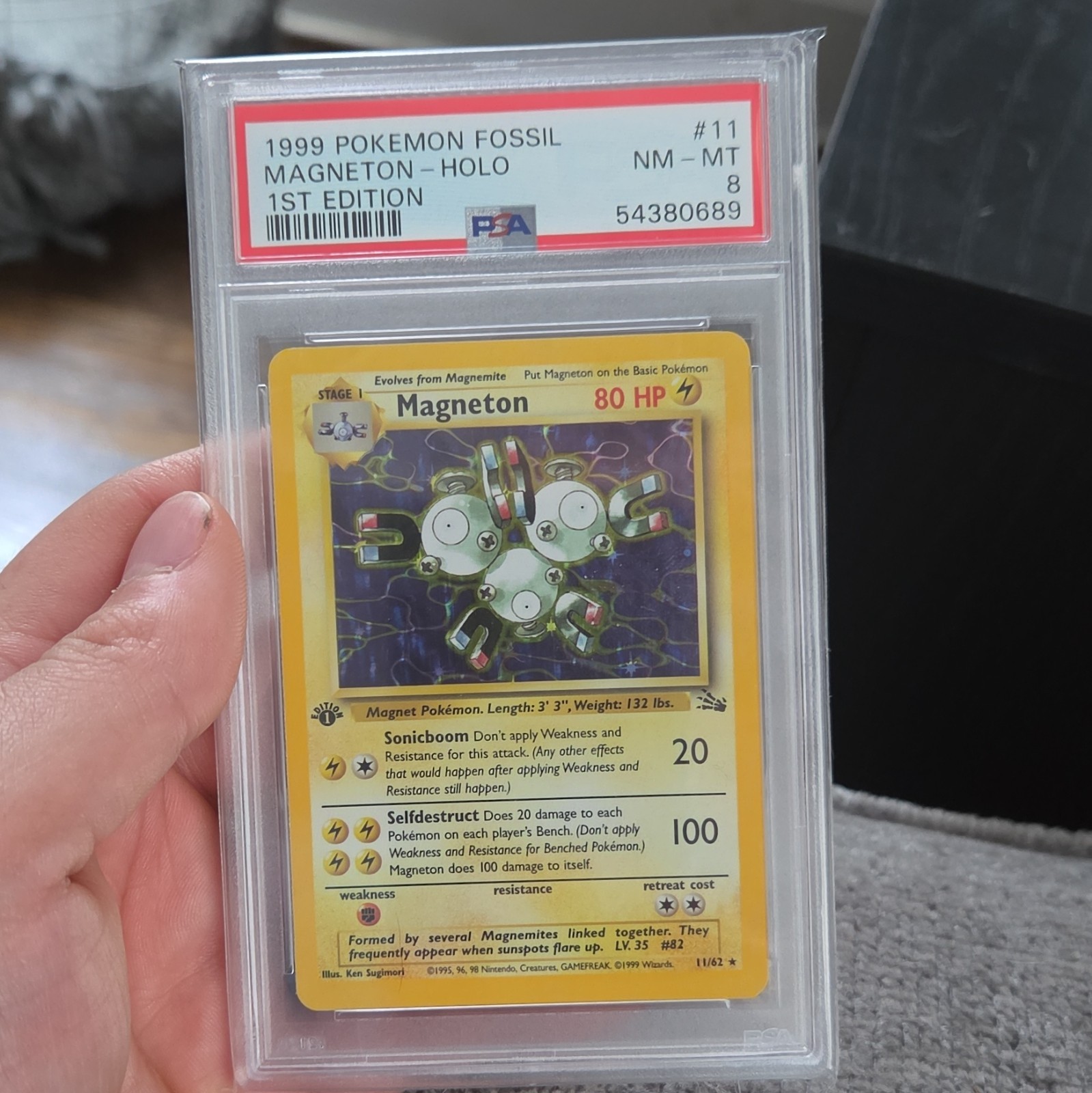 Pokémon 1999 Fossil Magneton Holo 1st Edition #11 PSA 8 Cert 54380689 Pokémon 1999 Fossil Magneton Holo 1st Edition #11 PSA 8 Cert 54380689