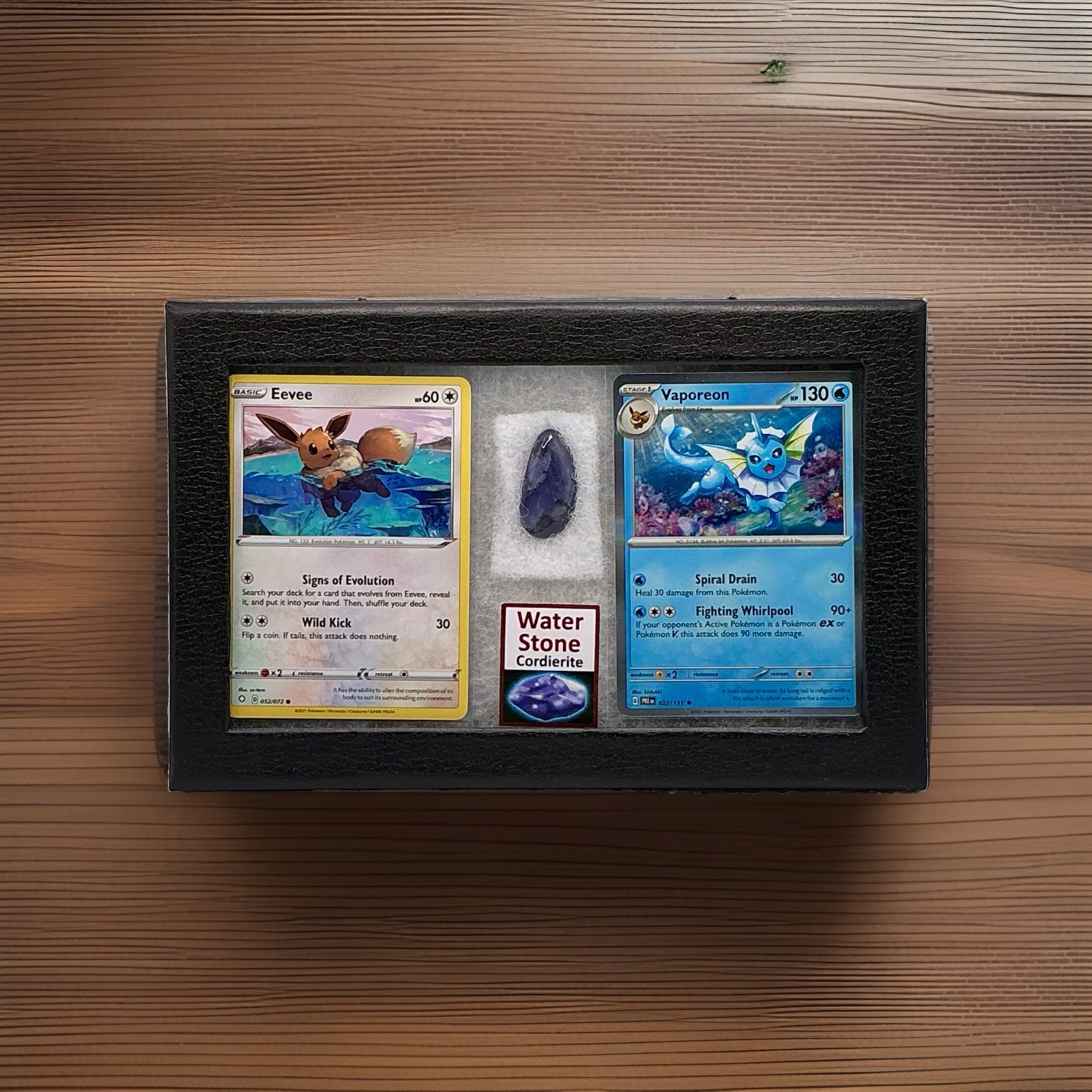 Eevee And Vaporeon Pokemon Cards With Authentic Water Stone Cordierite Display