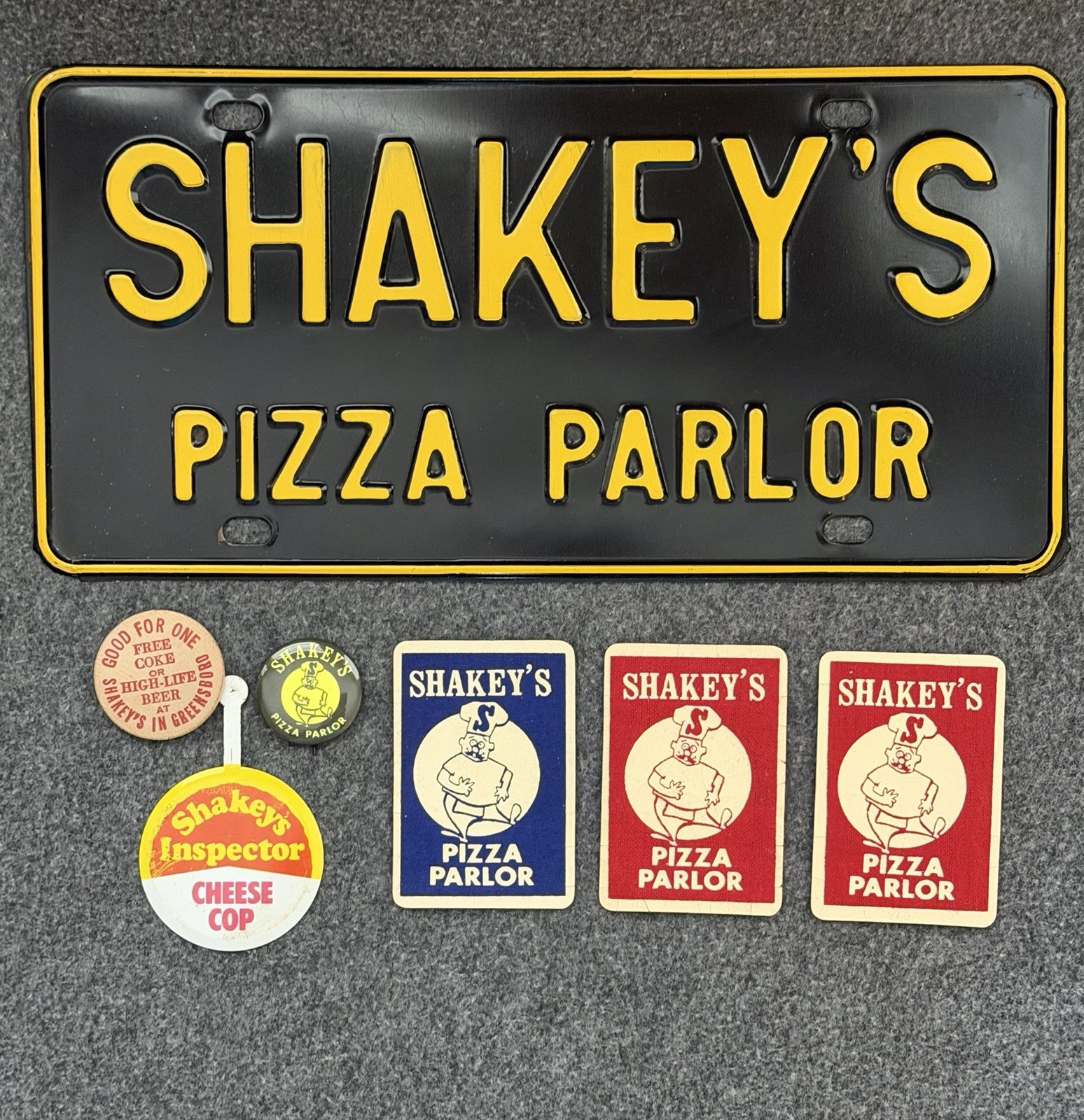 Vintage SHAKEY’S PIZZA PARLOR Steel Booster License Plate Sign 1960s 70s & Misc. Vintage SHAKEY’S PIZZA PARLOR Steel Booster License Plate Sign 1960s 70s & Misc.