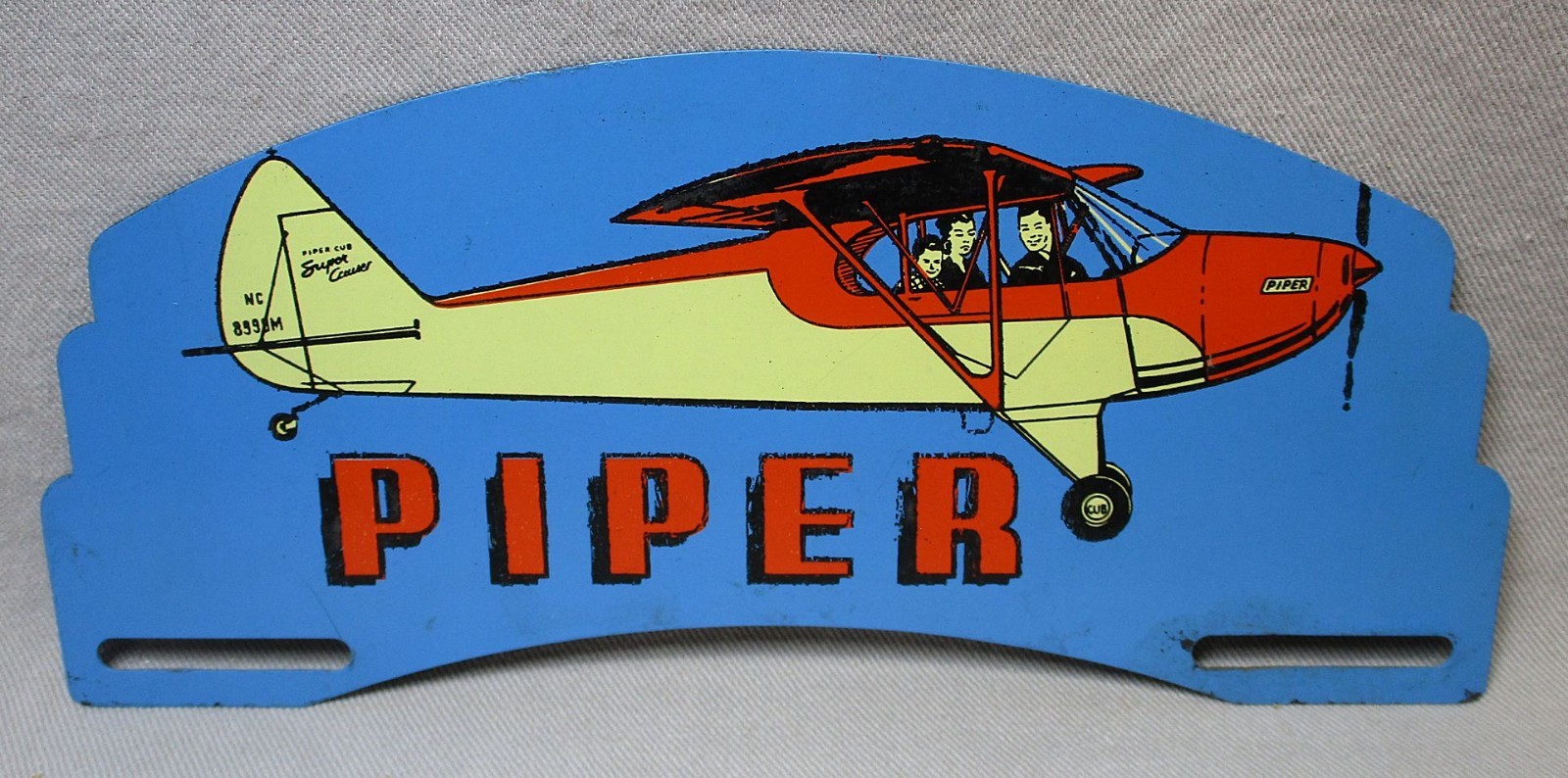 Vintage 1950’s Piper Cub Aircraft Steel License Plate Topper / Advertising Sign Vintage 1950’s Piper Cub Aircraft Steel License Plate Topper / Advertising Sign