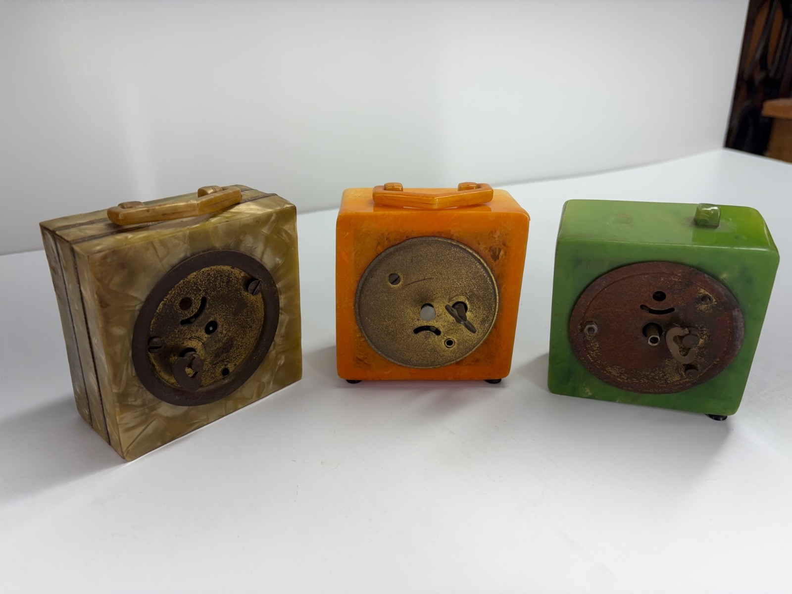 Appear to be catalin bakelite clocks. You be the judge Appear to be catalin bakelite clocks. You be the judge