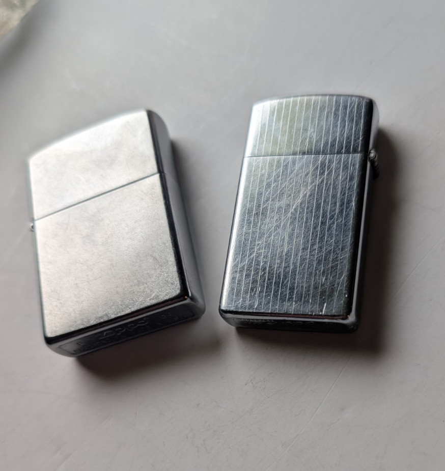 ZIPPO LIGHTER 1974 SLIM & F 24 ZIPPO ~ Both with Good Spark ~ Pre-Owned USED ZIPPO LIGHTER 1974 SLIM & F 24 ZIPPO ~ Both with Good Spark ~ Pre-Owned USED