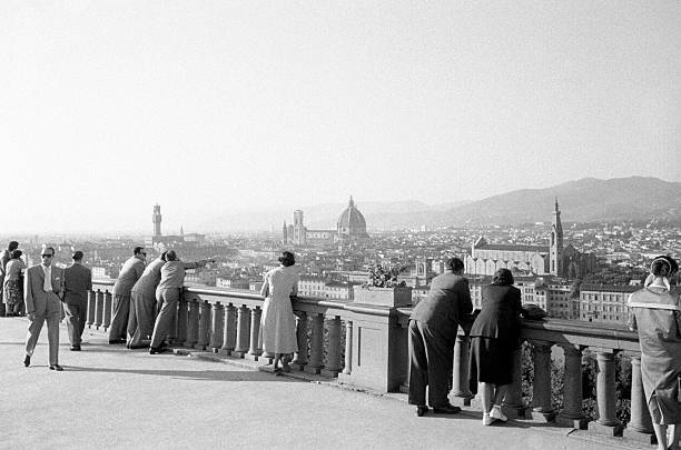 People leaning parapet Piazzale Michelangelo\' s terrace look city - Old Photo