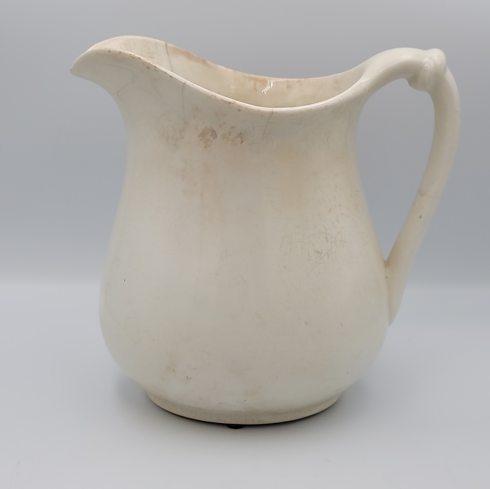 Antique White Ironstone Pitcher - Stained and Crazing Antique White Ironstone Pitcher - Stained and Crazing