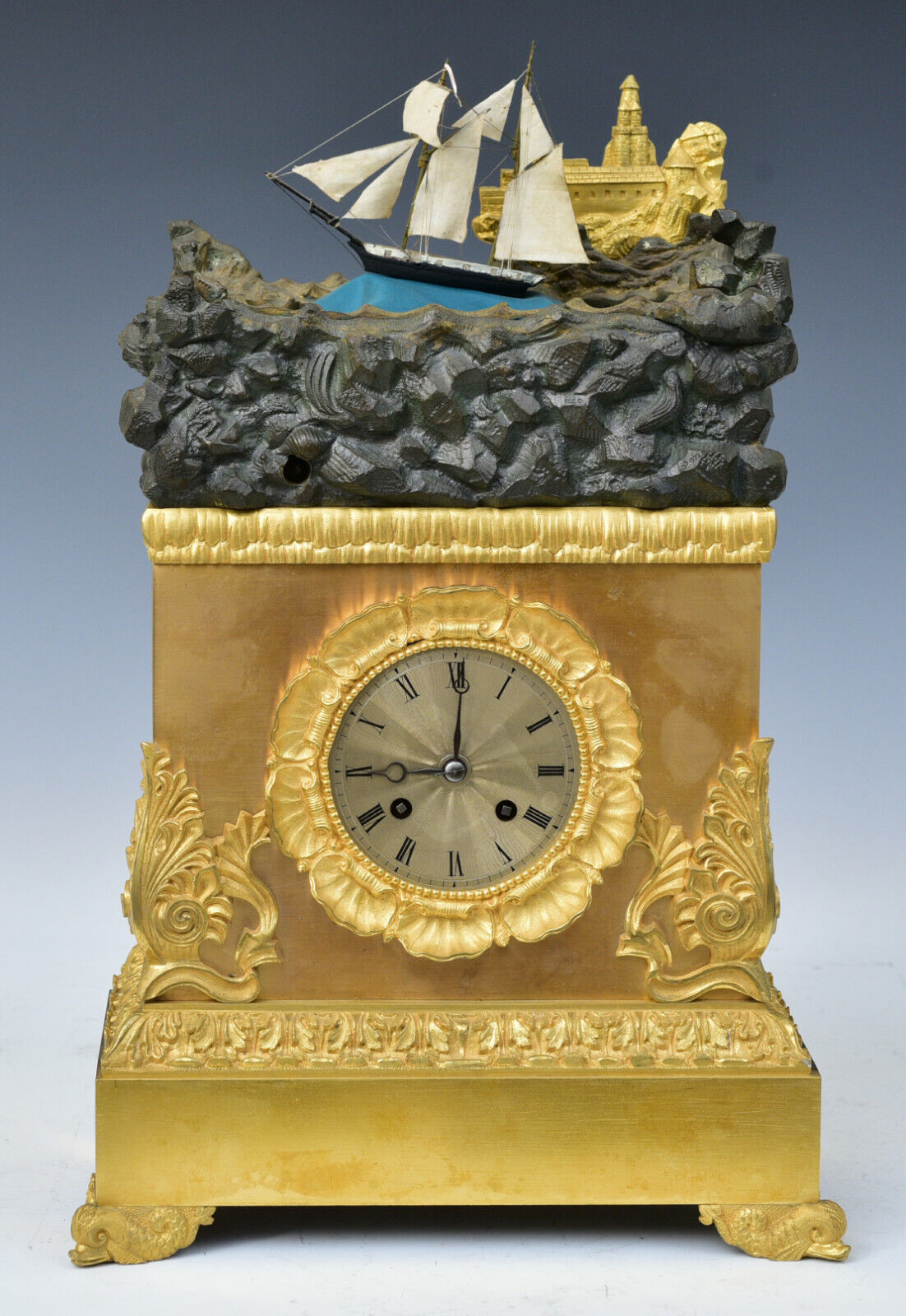 French Empire Gilt Bronze Mantle Clock with rocking ship automaton, circa 1830