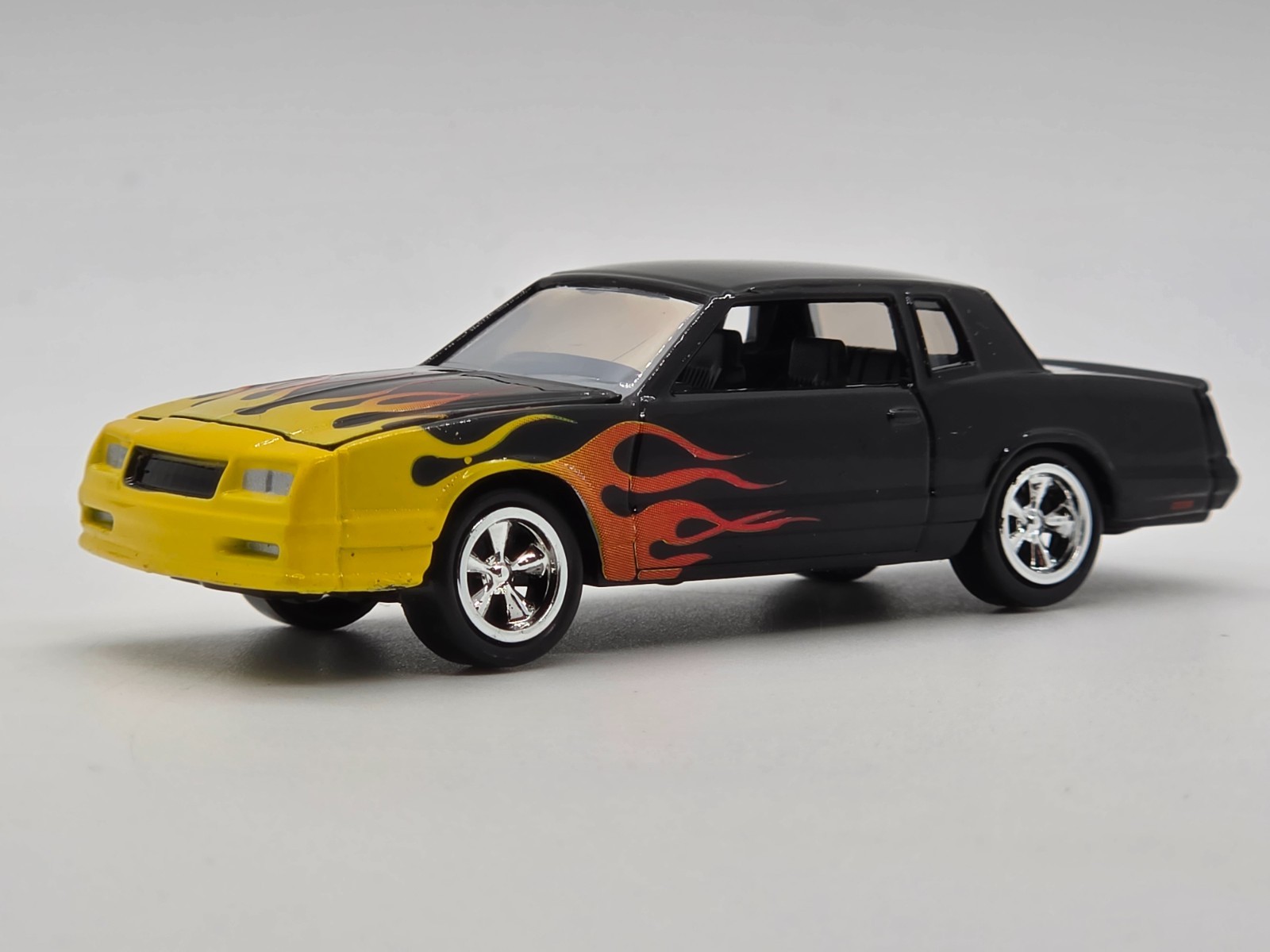 2010 Johnny Lightning 1987 Chevrolet Monte Carlo SS Black Flames Loose 1:64