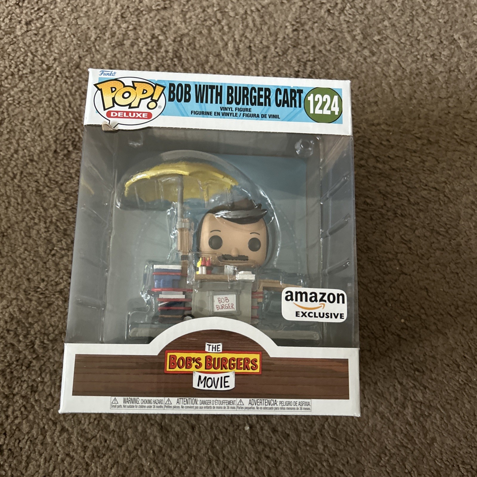 Funko Pop Deluxe: Bob's Burgers - Bob With Burger Cart - Amazon (AM)... Funko Pop Deluxe: Bob's Burgers - Bob With Burger Cart - Amazon (AM)...