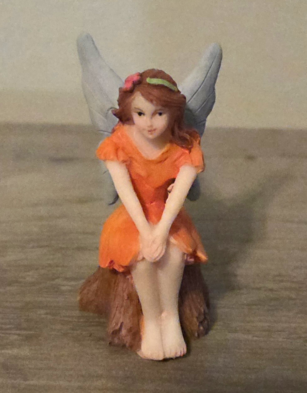 Fantasy Fairy Theme Sitting Fairy Figurine Orange Dress with Gray Wings Fantasy Fairy Theme Sitting Fairy Figurine Orange Dress with Gray Wings