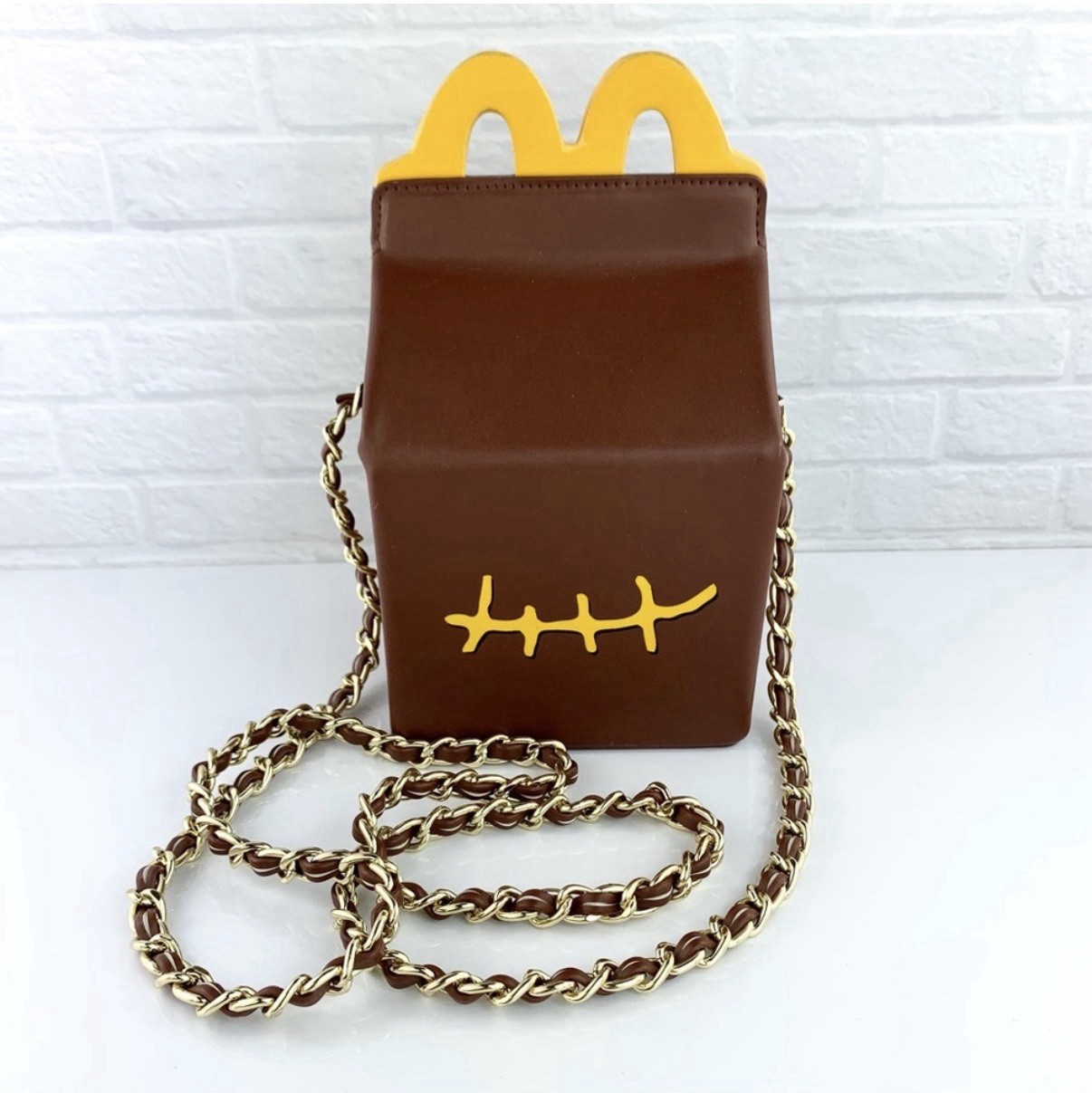 McDonald's Travis Scott x McDonald's Brown & Yellow Chain Strap Clutch Bag McDonald's Travis Scott x McDonald's Brown & Yellow Chain Strap Clutch Bag