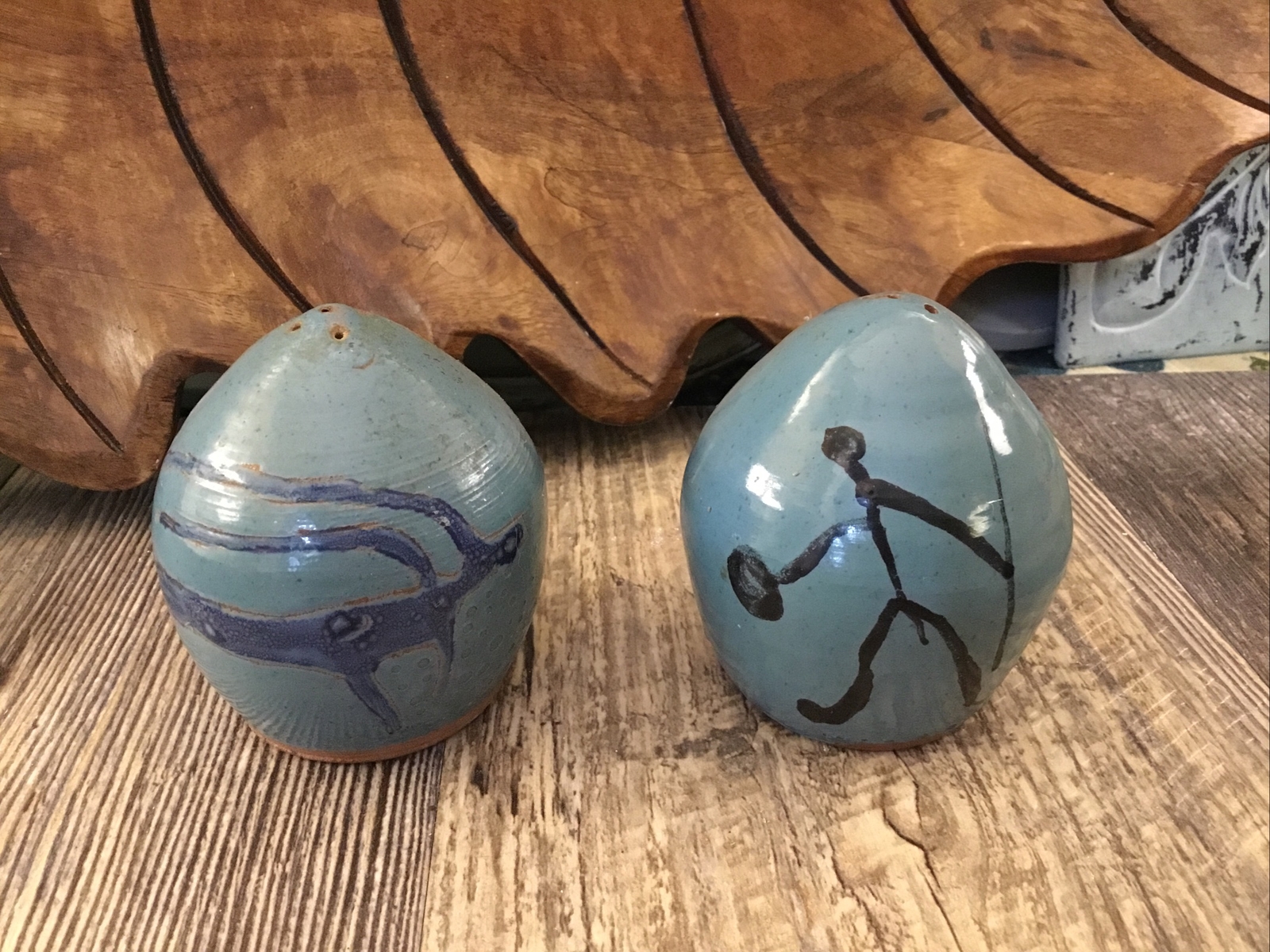 red clay salt pepper cave drawings cork bottoms marked LF Teal Color 2 1/2 Inche