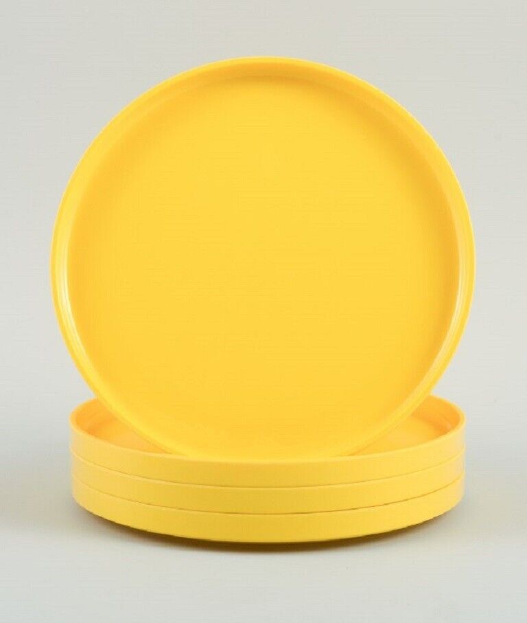 Massimo Vignelli for Heller, Italy. A set of 4 plates in yellow melamine.