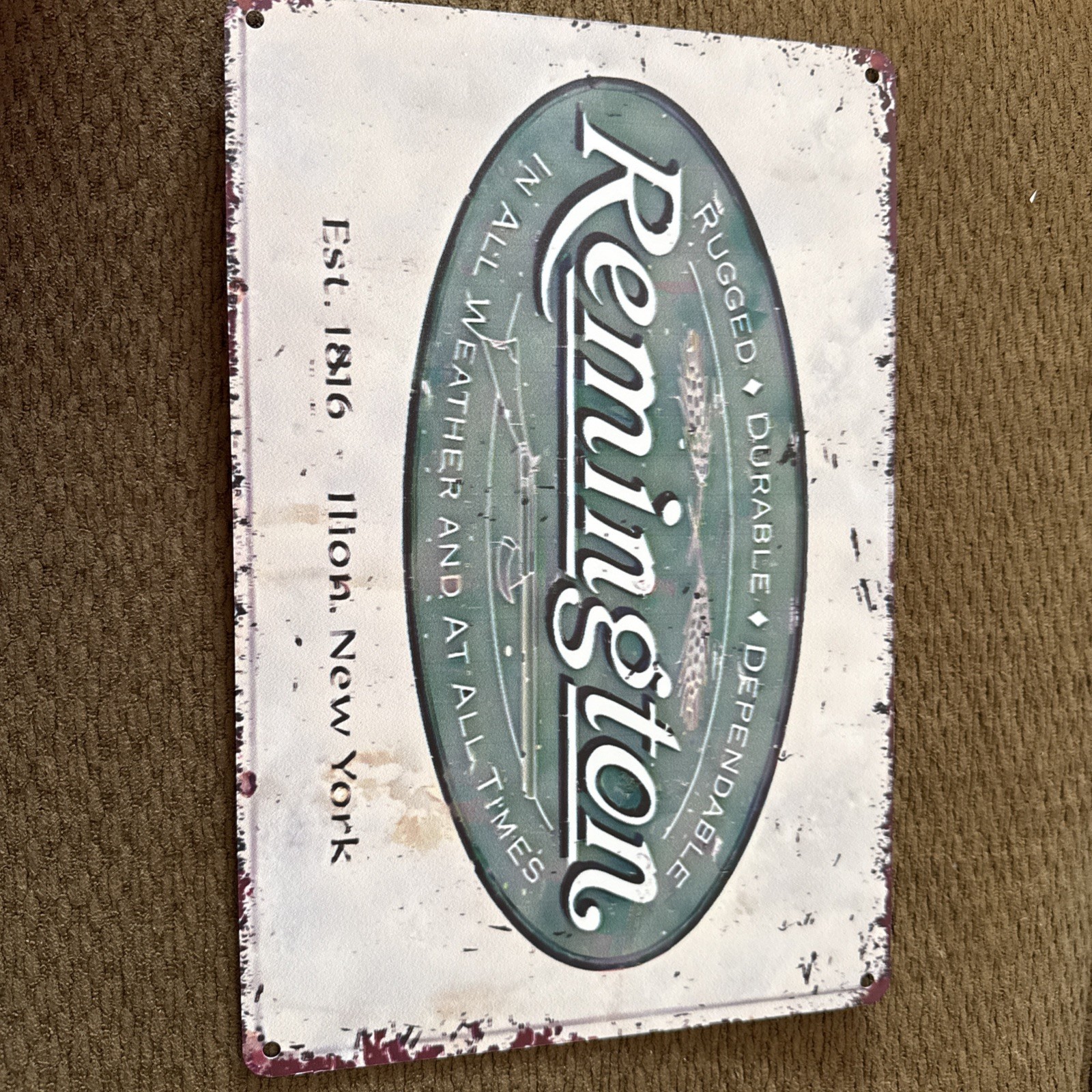 “Remington” Rugged And Dependable In All Weather Reproduction Metal Tin 8”x12” “Remington” Rugged And Dependable In All Weather Reproduction Metal Tin 8”x12”