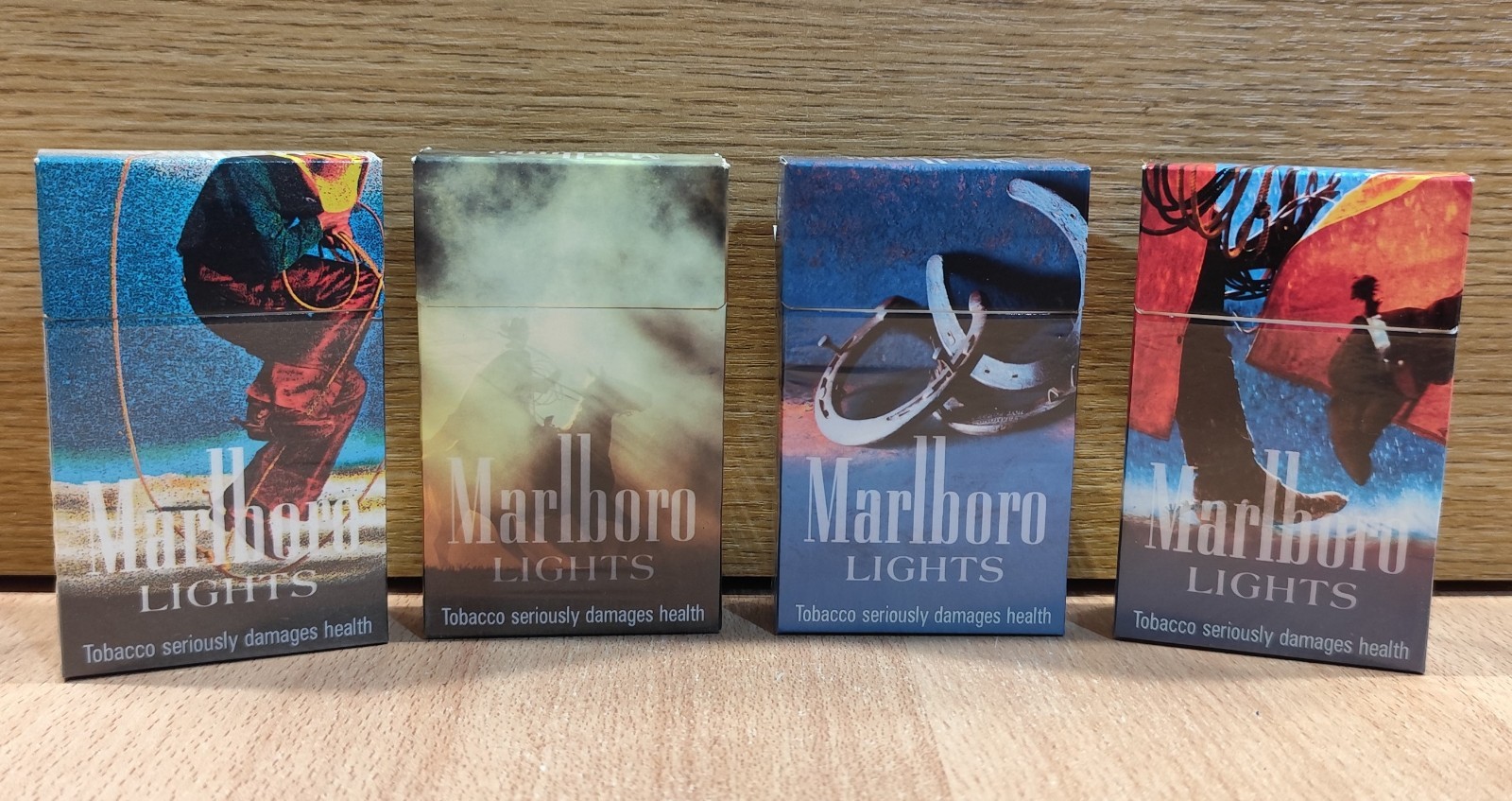 MARLBORO LIGHTS CIGARETTES SET OF FOUR EMPTY PACKS COUNTRY SPECIALS EDITION MARLBORO LIGHTS CIGARETTES SET OF FOUR EMPTY PACKS COUNTRY SPECIALS EDITION