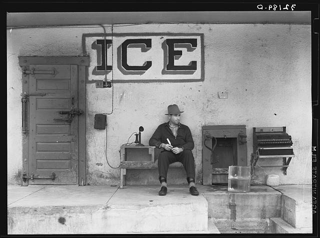 Photo:Harlingen Texas 1930s Ice for Sale Man Sitting Storefront Sign