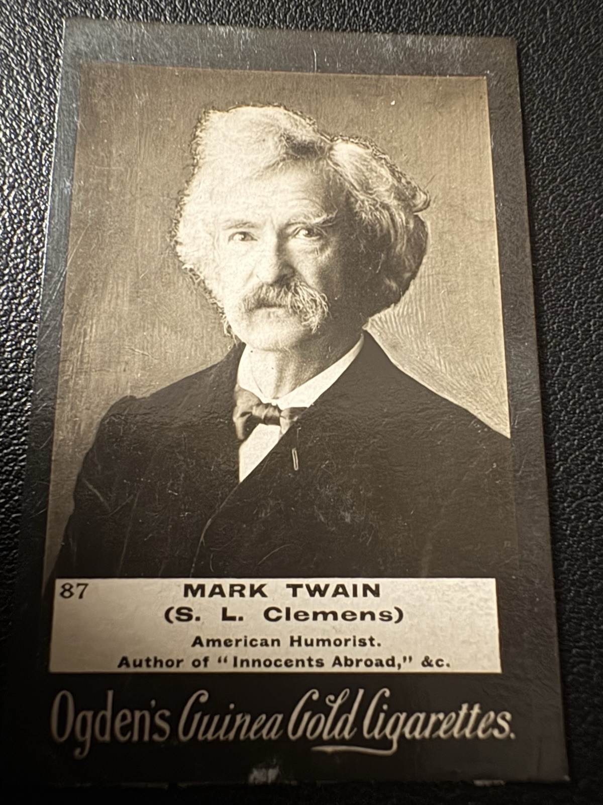 Beautiful NR Mint 1901 Mark Twain Ogdens Guinea Gold Cigarette Card.  