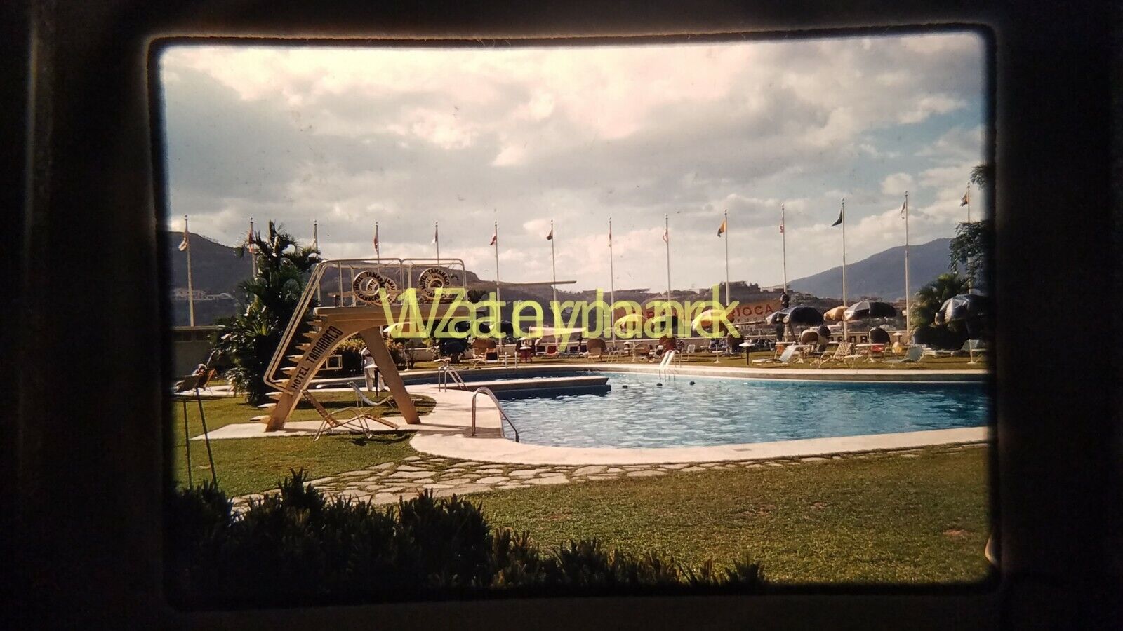 XXFU09 Vintage 35MM SLIDE POOL WITH HIGH DIVE, MOUNTAINS IN BACKGROUND