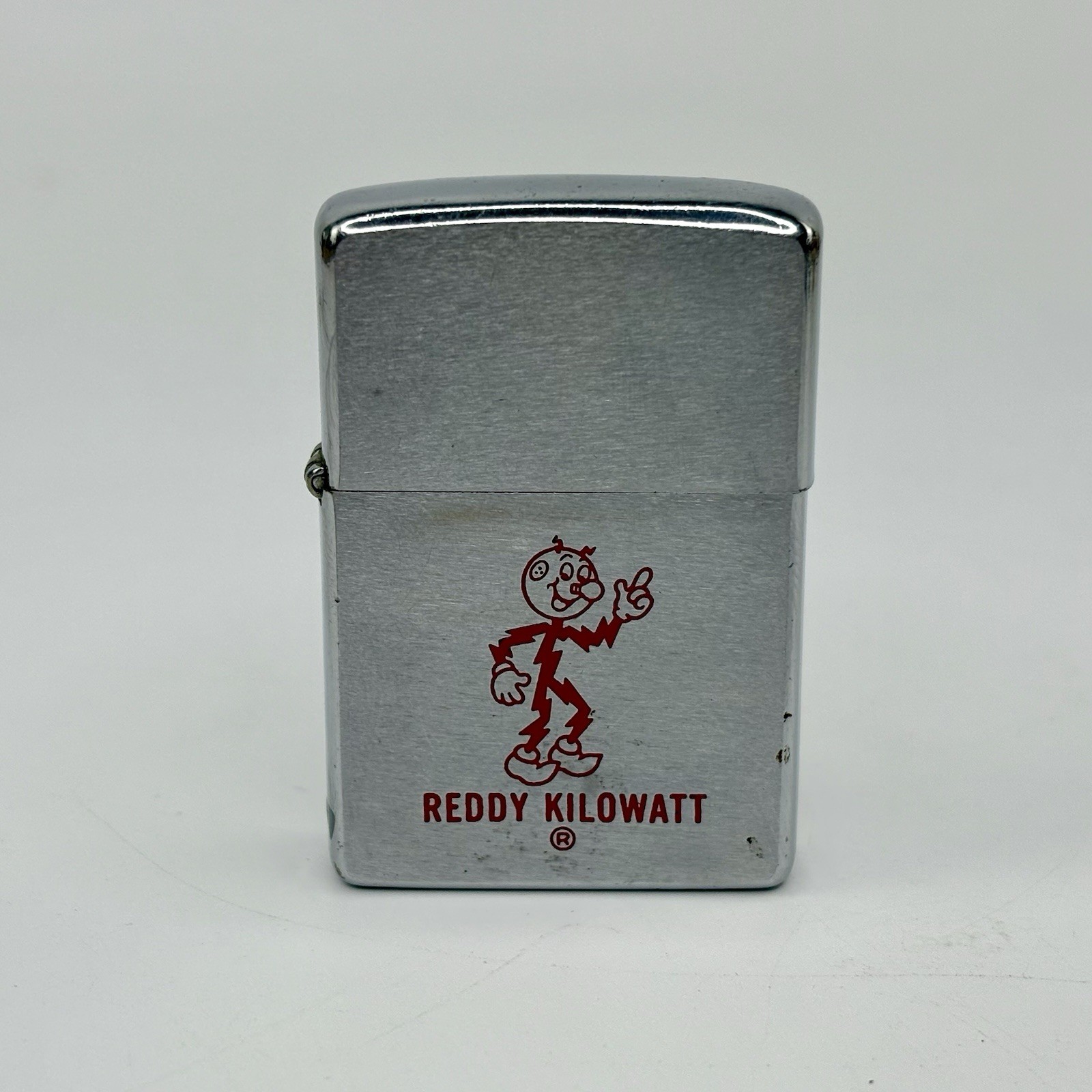 Vtg 1977 Chrome Etched Enameled "Reddy Kilowatt" Logo Zippo Lighter Vtg 1977 Chrome Etched Enameled "Reddy Kilowatt" Logo Zippo Lighter