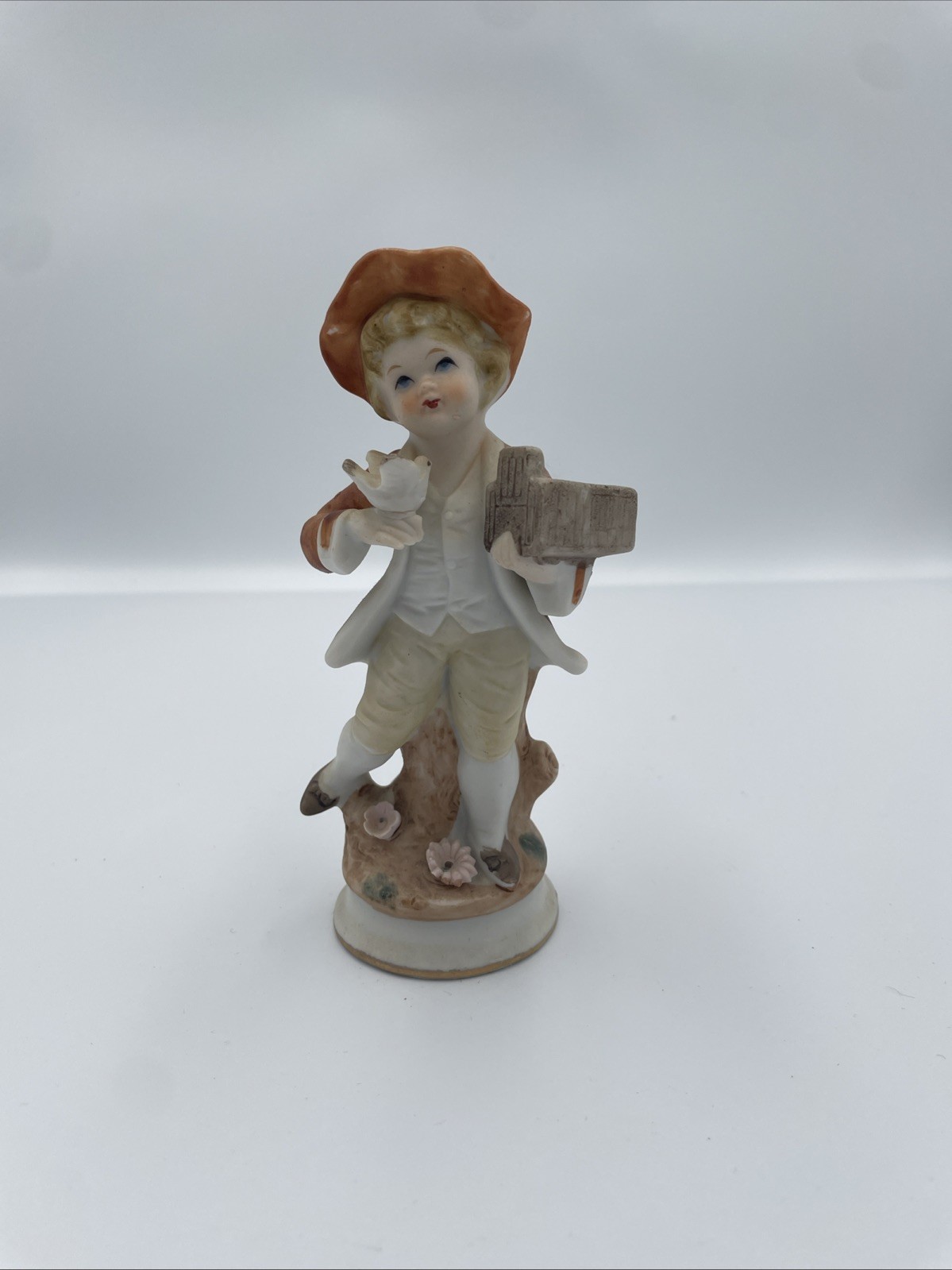 Vintage Porcelain Figurine Little Boy 20th Century Japan 5.5" Carrying Cage Vintage Porcelain Figurine Little Boy 20th Century Japan 5.5" Carrying Cage