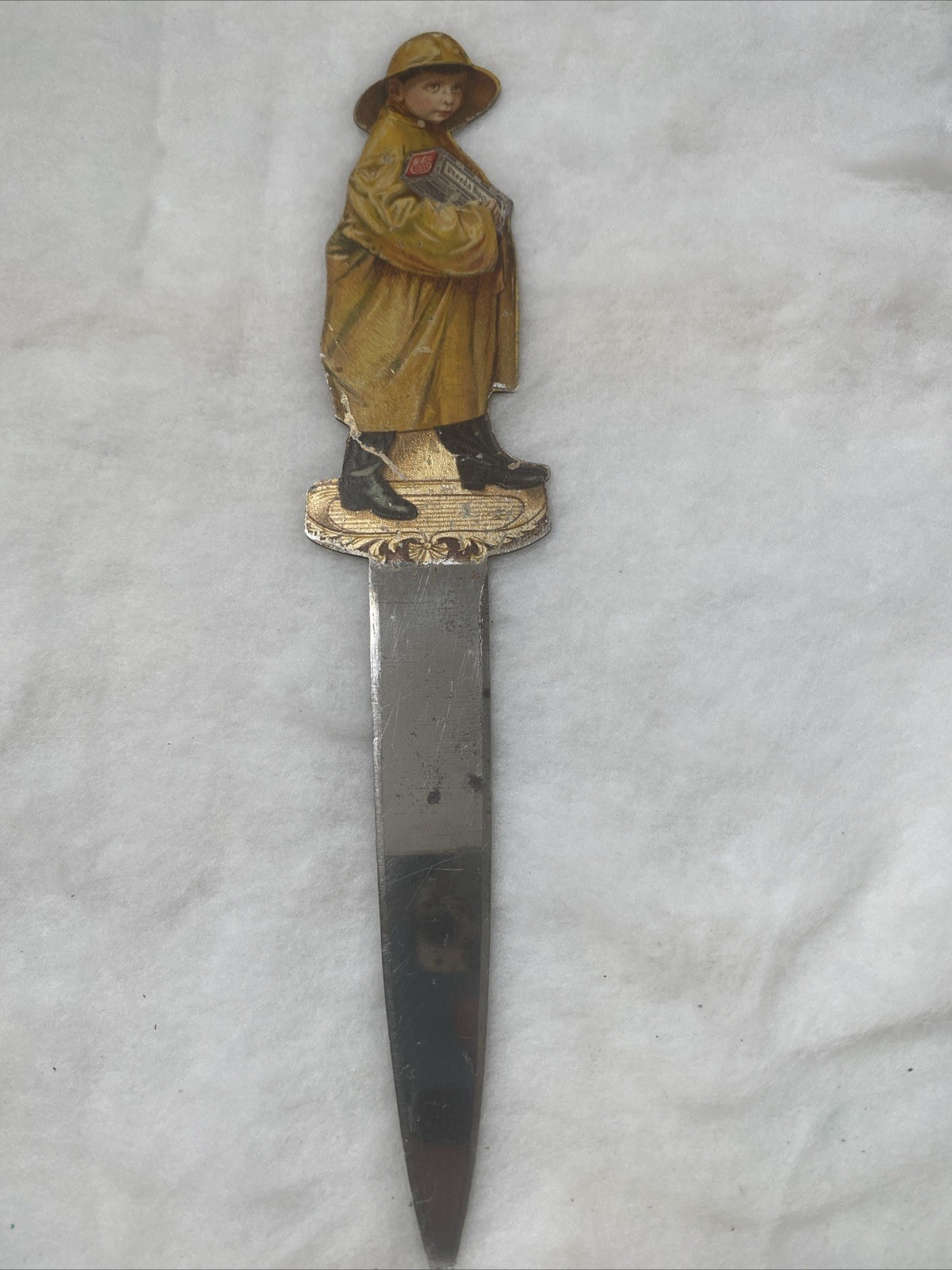 Antique Uneeda Nabisco Biscuits Boy In Raincoat Advertising Metal Letter Opener Antique Uneeda Nabisco Biscuits Boy In Raincoat Advertising Metal Letter Opener