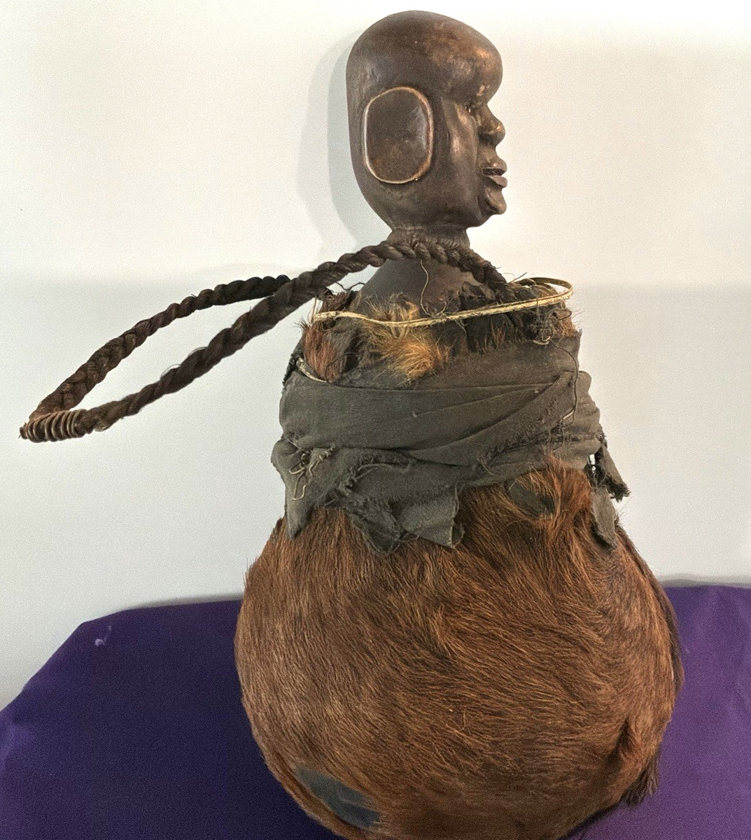 TALL VINTAGE EAST AFRICAN TANZANIAN FUR COVERED GOURD WITH FIGURAL STOPPER TALL VINTAGE EAST AFRICAN TANZANIAN FUR COVERED GOURD WITH FIGURAL STOPPER