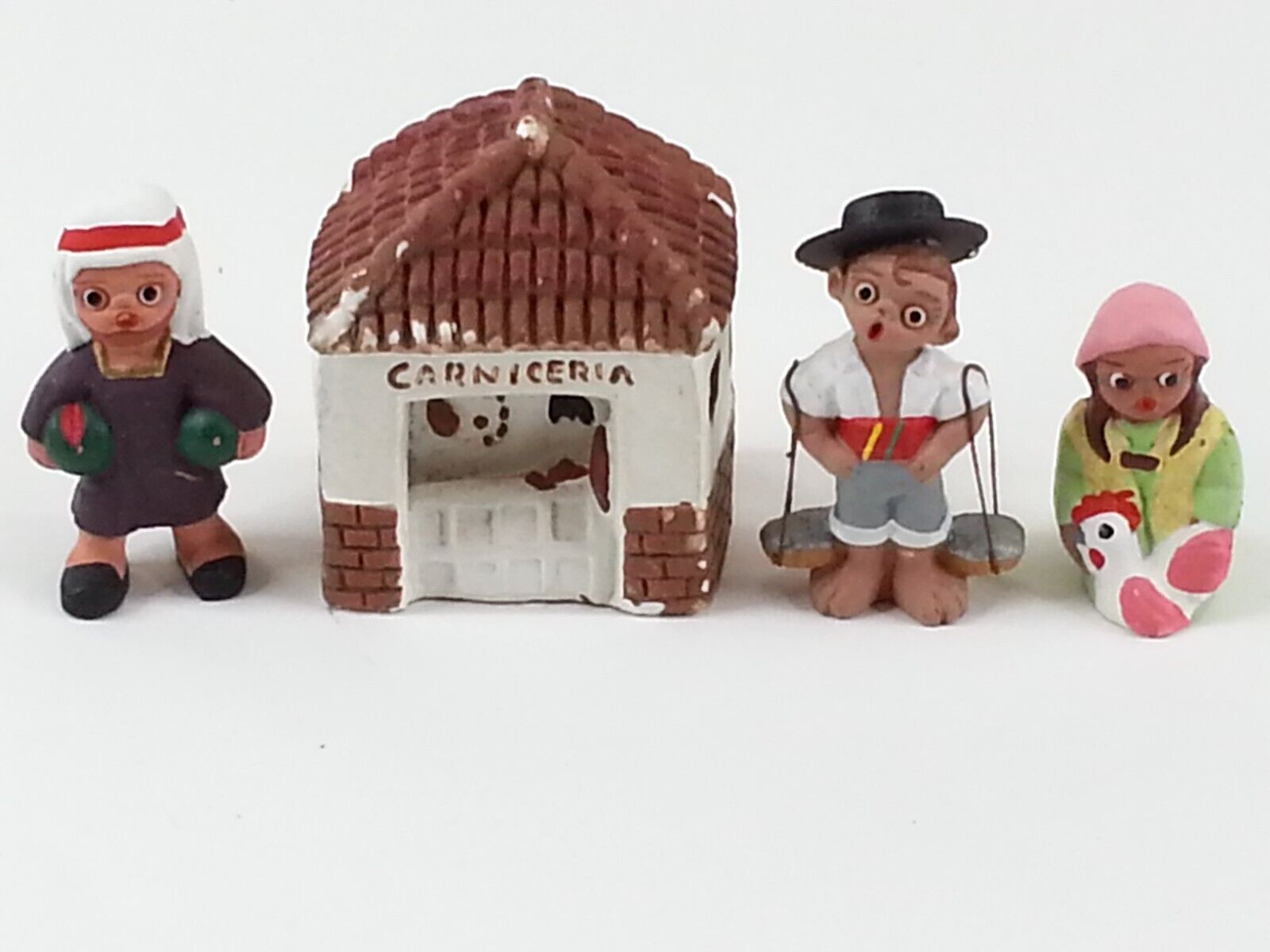 4 Piece Vintage Miniature Spanish Mud Village People And House Miniatures