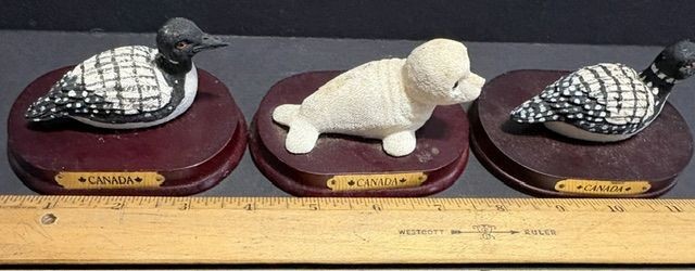 Miniatures: Loons (2) & Seal (1), resin/mounted on 4 inch base w/Canada plaque Miniatures: Loons (2) & Seal (1), resin/mounted on 4 inch base w/Canada plaque
