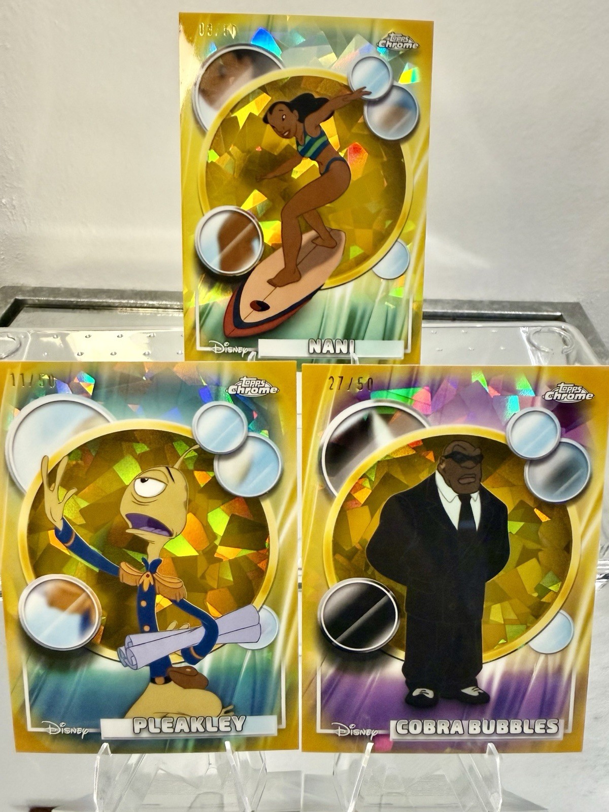 2026 Topps Chrome Sapphire Gold Refractors #/50 - Nani, Pleakley & Cobra Bubbles 2026 Topps Chrome Sapphire Gold Refractors #/50 - Nani, Pleakley & Cobra Bubbles