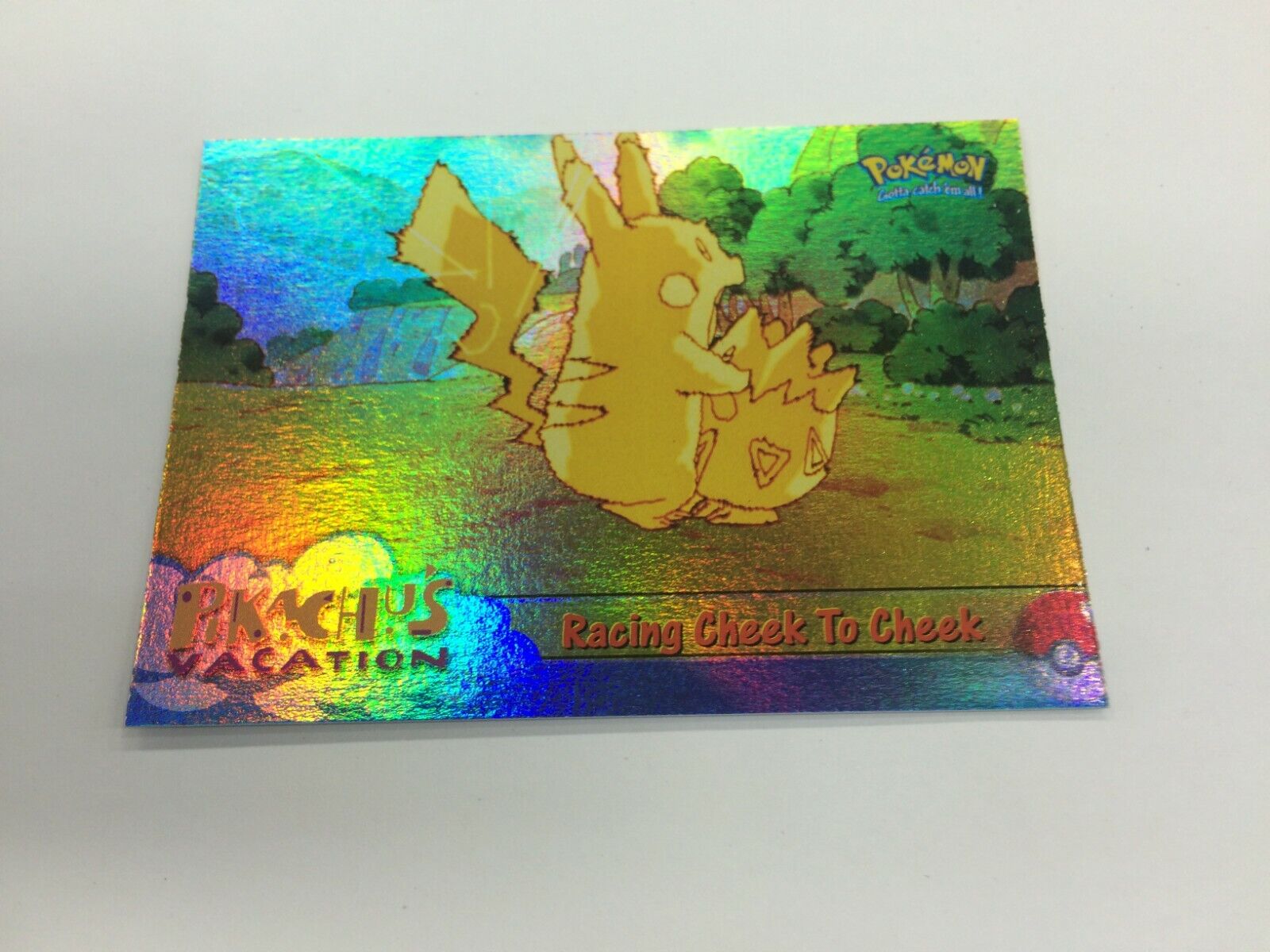 1999 TOPPS POKEMON FIRST MOVIE TRADING CARD HOLOFOIL CARD #48 RACING CHEEK TO