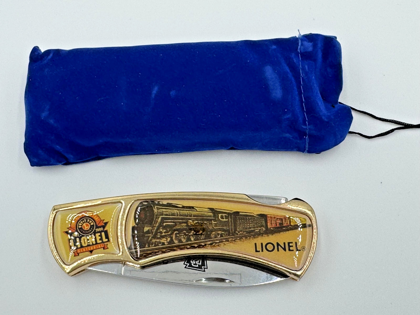 VINTAGE LIONEL CENTENNIAL 1900-2000 100TH ANNIVERSARY POCKET KNIFE W/ POUCH VINTAGE LIONEL CENTENNIAL 1900-2000 100TH ANNIVERSARY POCKET KNIFE W/ POUCH