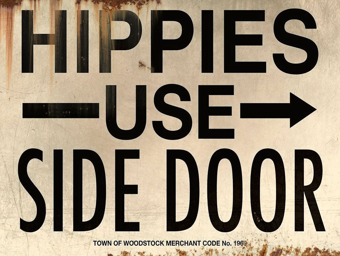HIPPIES USE SIDE DOOR TOWN WOODSTOCK HEAVY DUTY USA MADE METAL ADVERTISING SIGN HIPPIES USE SIDE DOOR TOWN WOODSTOCK HEAVY DUTY USA MADE METAL ADVERTISING SIGN