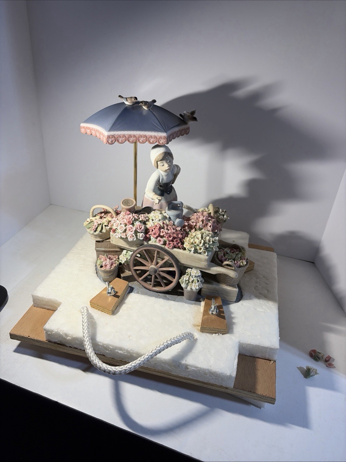 Lladro #1454 Flowers of the Season- Girl with Flower Cart, DAMAGE PRESENT. AS IS Lladro #1454 Flowers of the Season- Girl with Flower Cart, DAMAGE PRESENT. AS IS