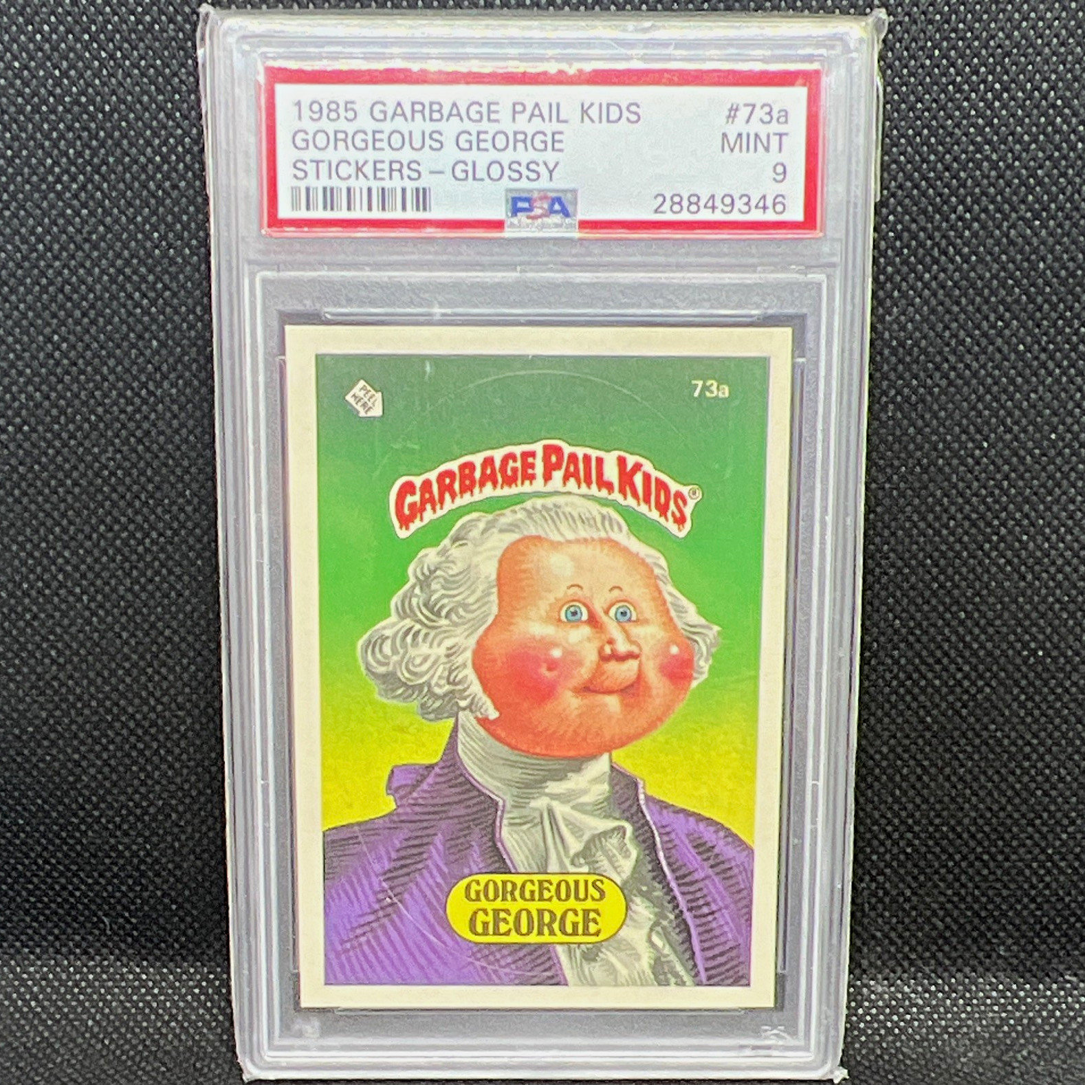 1985 Topps Garbage Pail Kids Gorgeous George #73a, Glossy Sticker, PSA 9 1985 Topps Garbage Pail Kids Gorgeous George #73a, Glossy Sticker, PSA 9