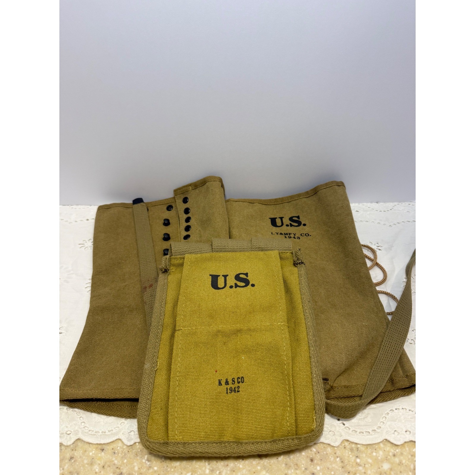 US Military Canvas Gaiters Marked 1943 & Ammunition Pouch 1942 Set US Military Canvas Gaiters Marked 1943 & Ammunition Pouch 1942 Set