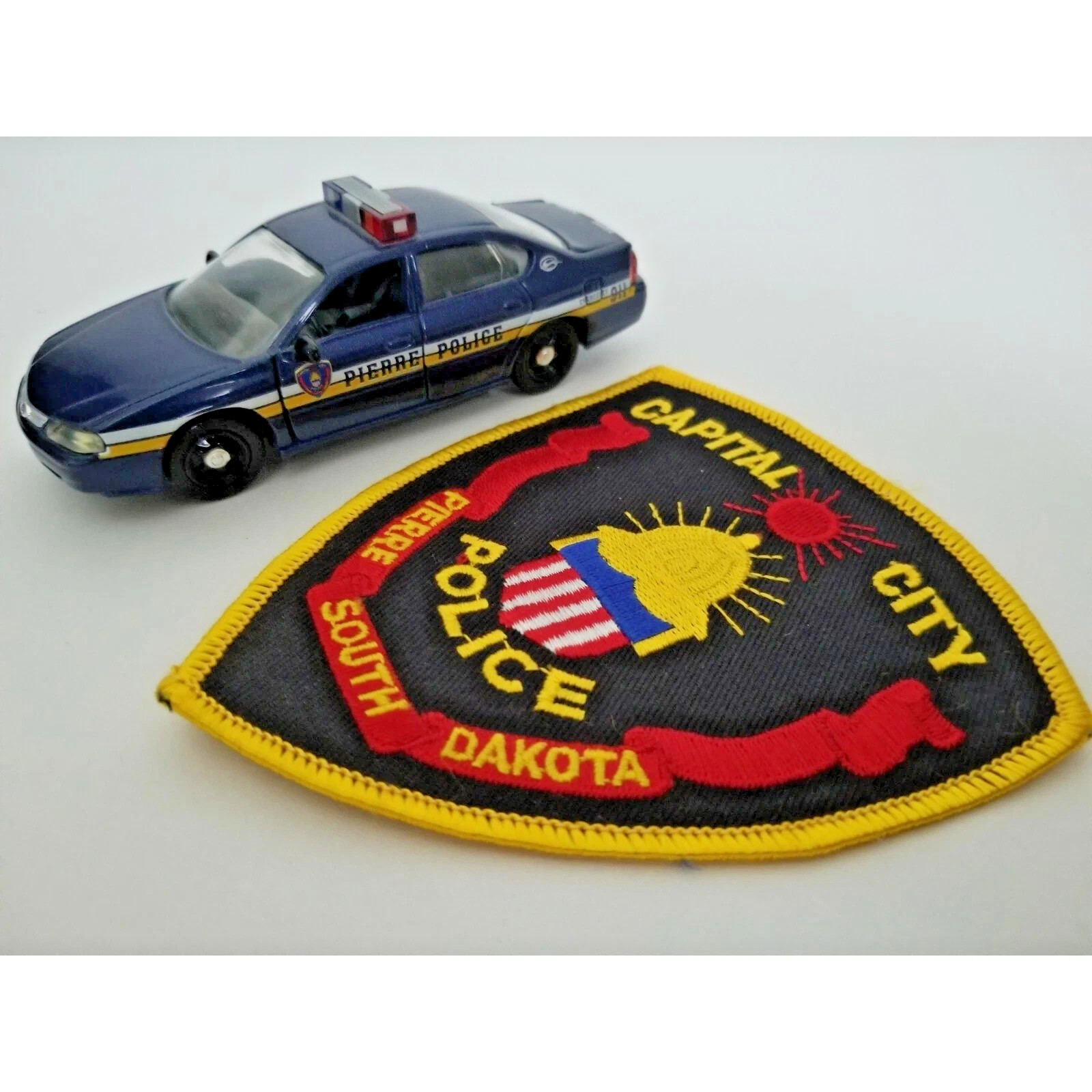 Roadchamps 1:43 Diecast Police Cruiser and Agency Patch Pierre SD Police Dept Roadchamps 1:43 Diecast Police Cruiser and Agency Patch Pierre SD Police Dept