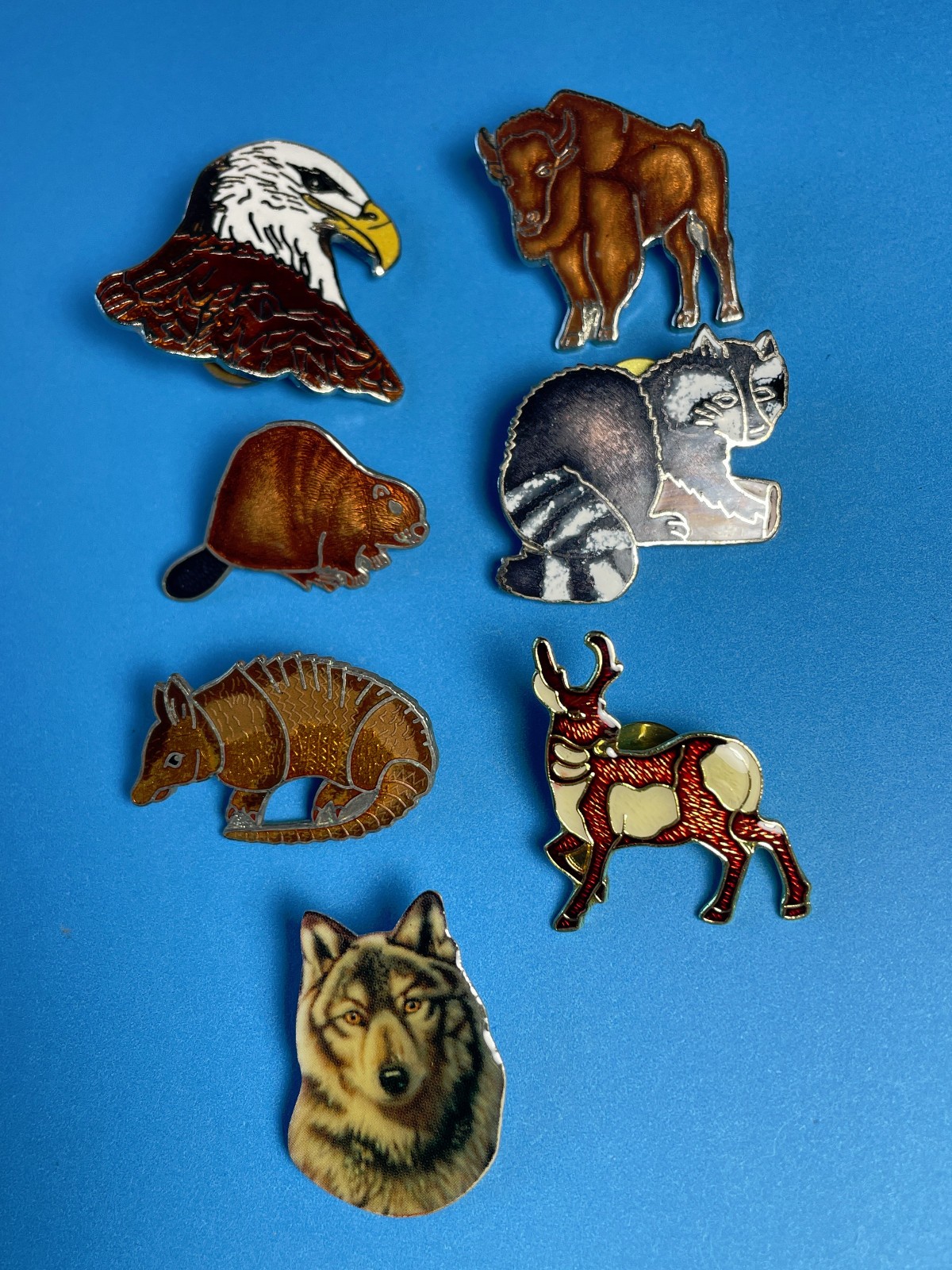 7 large vintage wildlife enamel lapel pins Beaver Raccoon Bison Bald Eagle Wolf 7 large vintage wildlife enamel lapel pins Beaver Raccoon Bison Bald Eagle Wolf