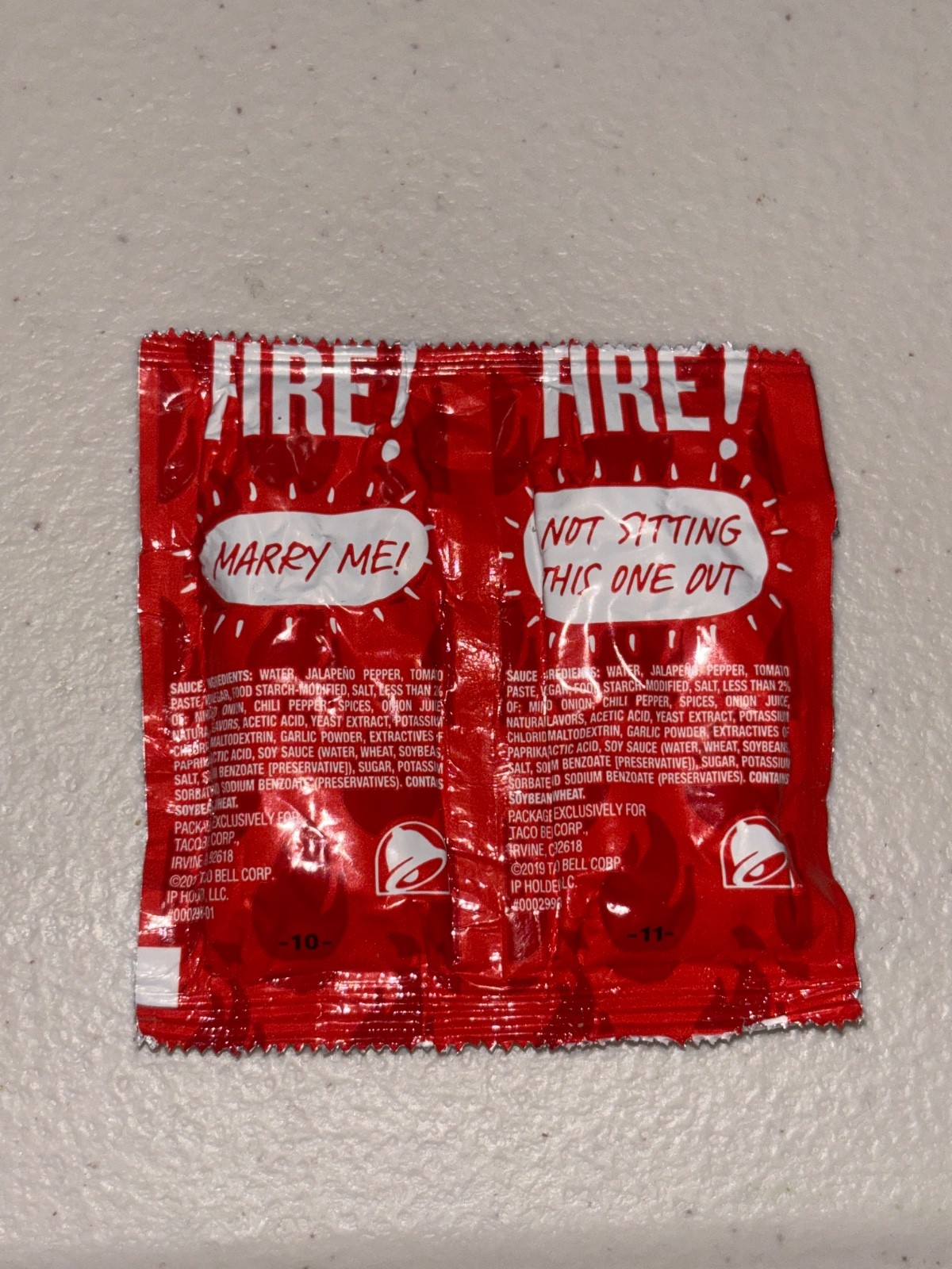 TACO BELL DOUBLE FIRE SAUCE PACKET (VERY RARE) RED FIRE SAUCE 10 & 11 TACO BELL DOUBLE FIRE SAUCE PACKET (VERY RARE) RED FIRE SAUCE 10 & 11