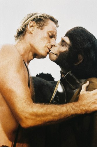 Charlton Heston and Kim Hunter kiss in Planet of the Apes 24x36 Poster Charlton Heston and Kim Hunter kiss in Planet of the Apes 24x36 Poster
