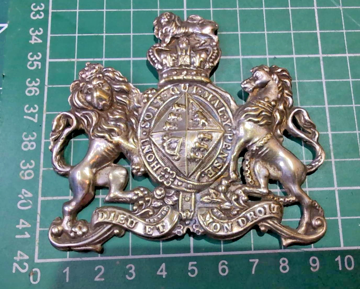 Vintage/antique metal element featuring the British Royal Coat of Arms Vintage/antique metal element featuring the British Royal Coat of Arms