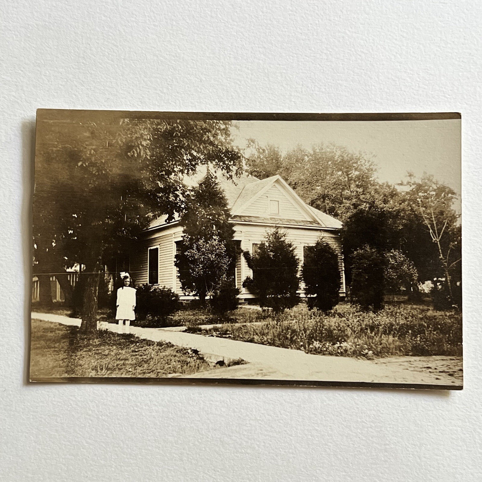 Antique RPPC Real Photograph Postcard Adorable Girl Sidewalk In Front Of House