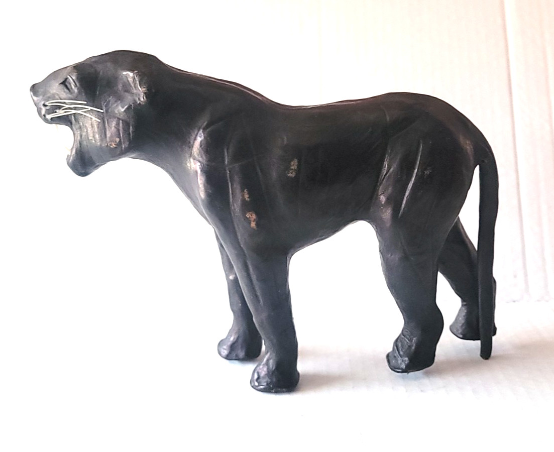 Vintage Leather Wrapped Black Panther (In Preowned as Found Preowned Condition). Vintage Leather Wrapped Black Panther (In Preowned as Found Preowned Condition).