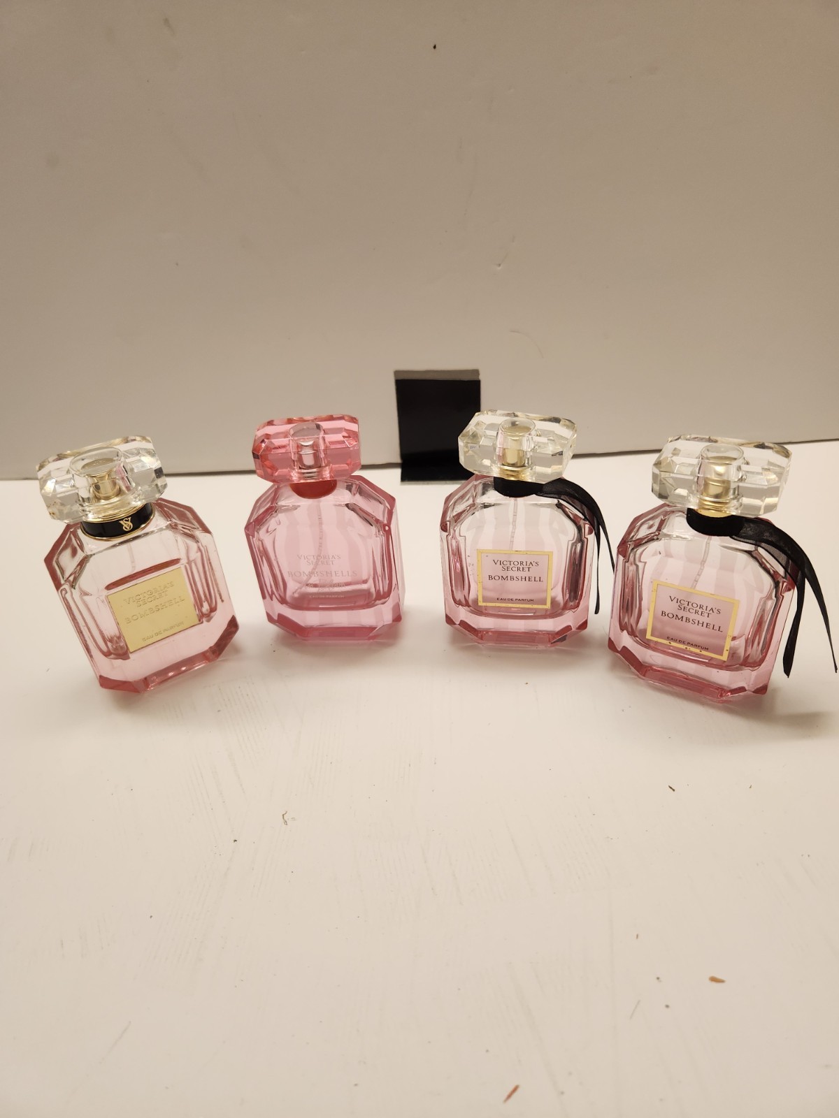 Four EMPTY Victoria's Secret Bombshell Perfume Bottles 1.7 Oz Four EMPTY Victoria's Secret Bombshell Perfume Bottles 1.7 Oz