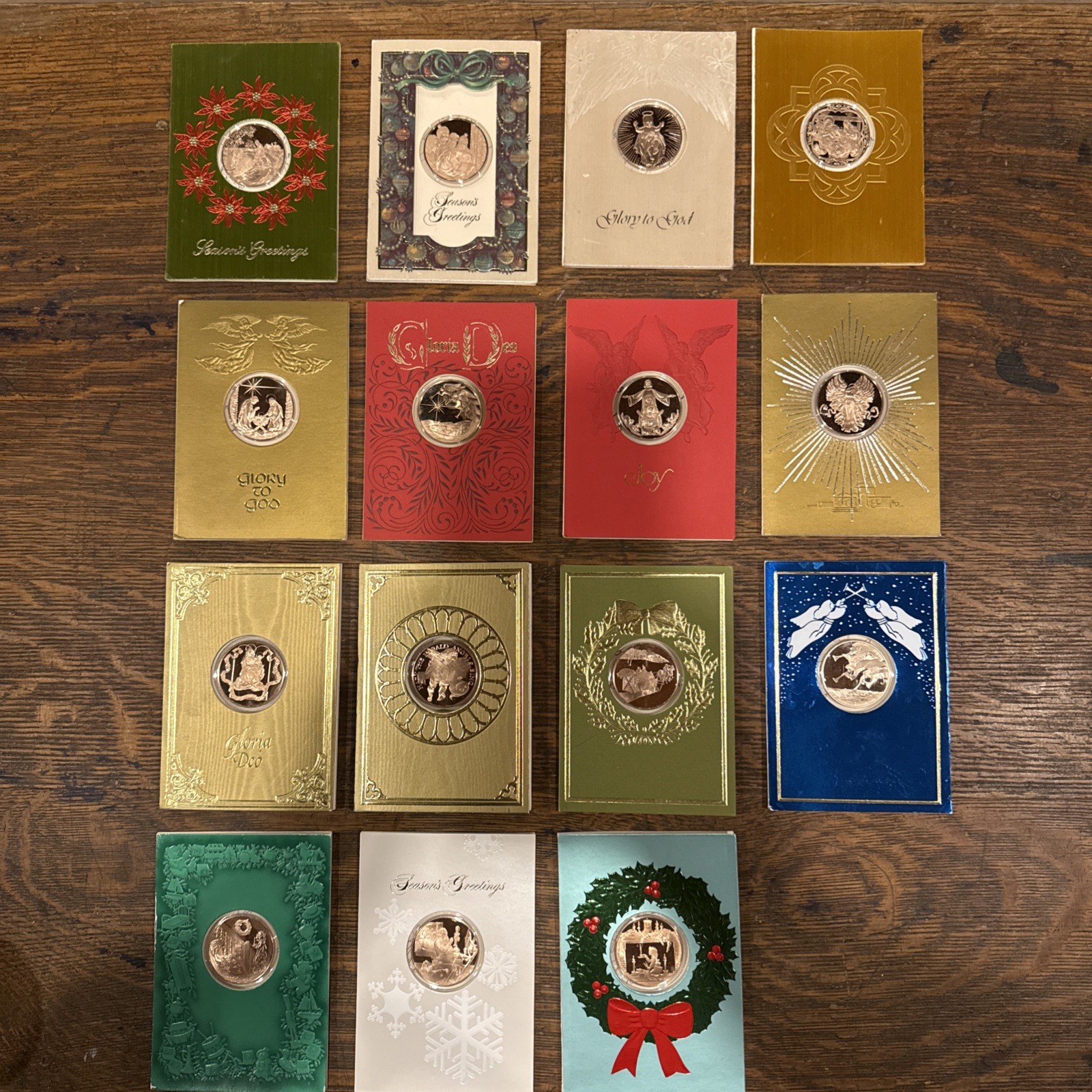 15 Franklin Mint Christmas Folders With Magi coin Circa 1973 To 1988 15 Franklin Mint Christmas Folders With Magi coin Circa 1973 To 1988