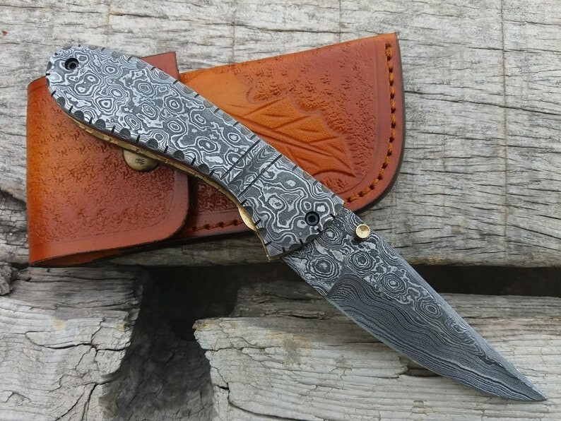 Beautiful handmade full Damascus folding/pocket knife liner lock. Beautiful handmade full Damascus folding/pocket knife liner lock.