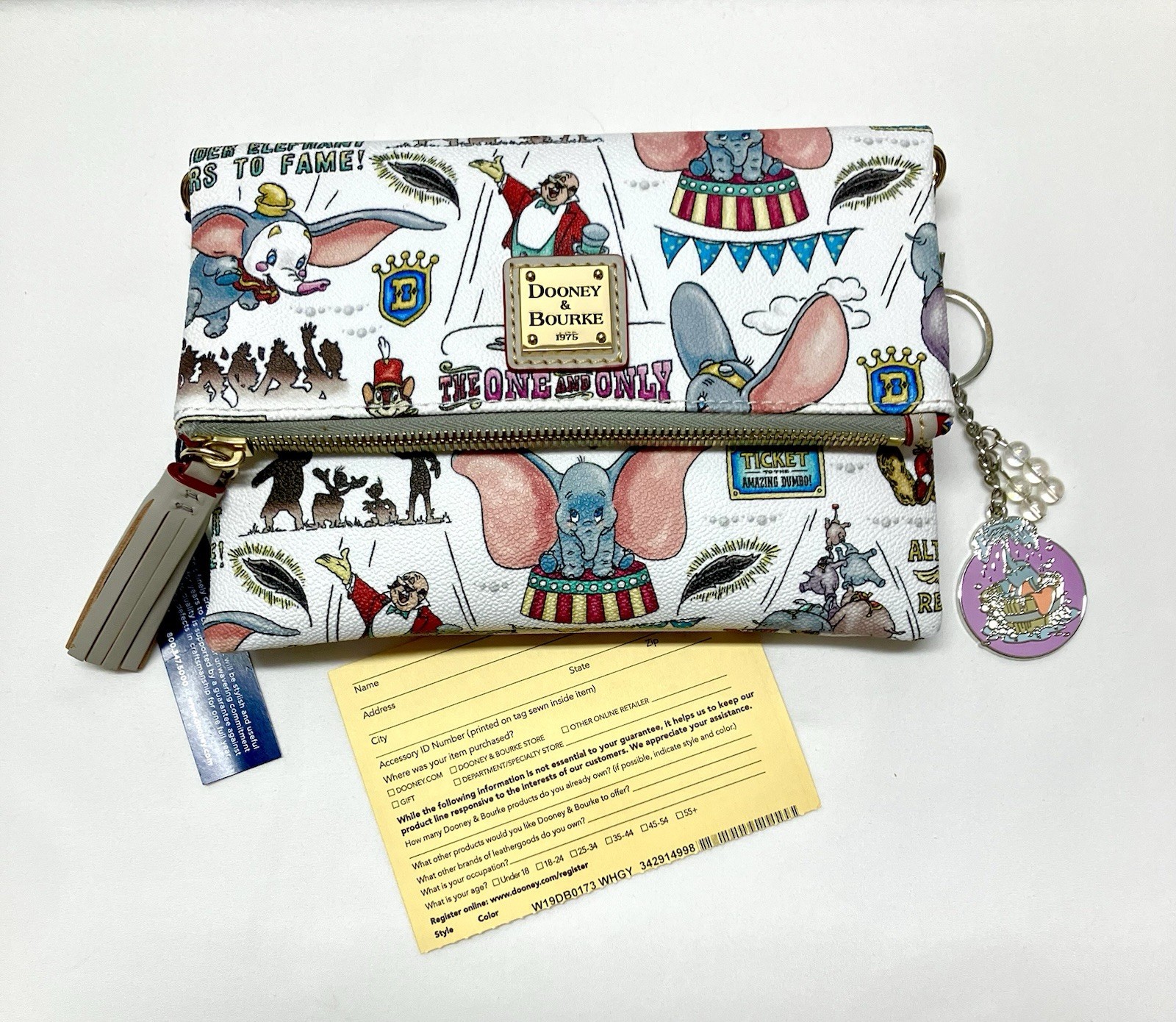 Dooney & Bourke Disney Dumbo Crossbody/Clutch Fold over Bag and Purse Charm NWT Dooney & Bourke Disney Dumbo Crossbody/Clutch Fold over Bag and Purse Charm NWT