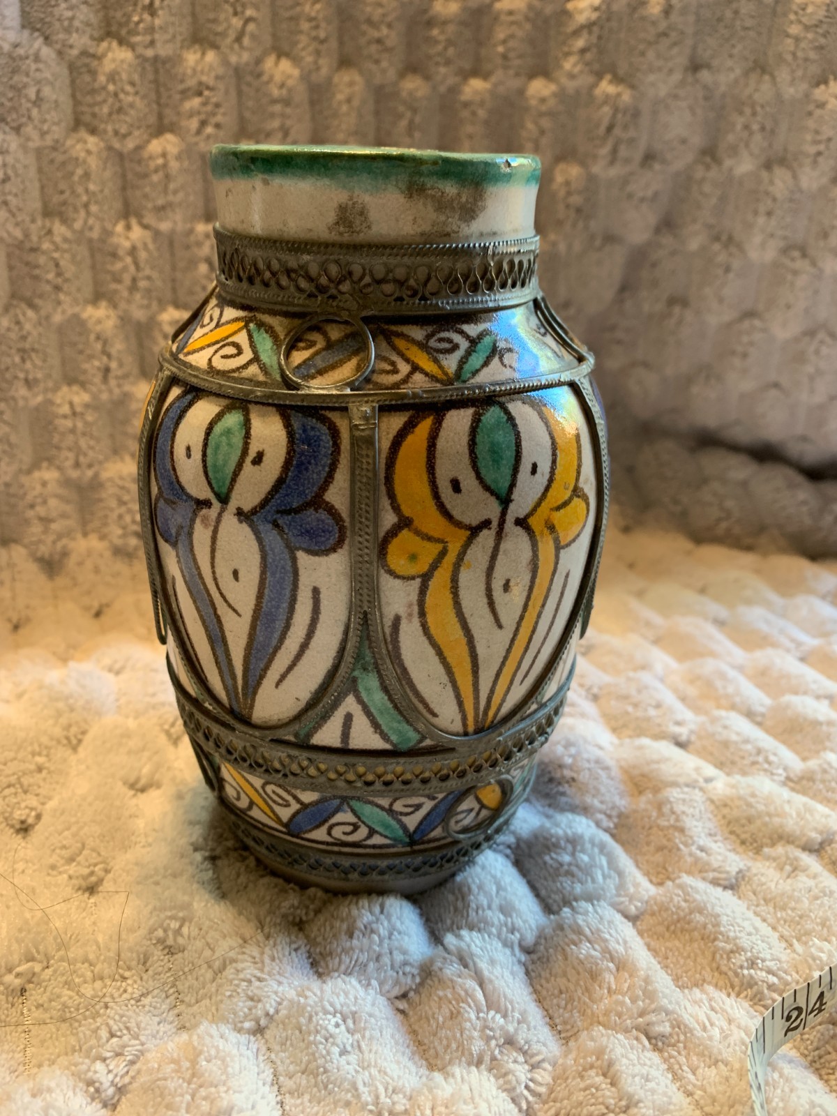 Vintage hand-painted Moroccan Fez pottery vase with silver tone metal filigree. Vintage hand-painted Moroccan Fez pottery vase with silver tone metal filigree.