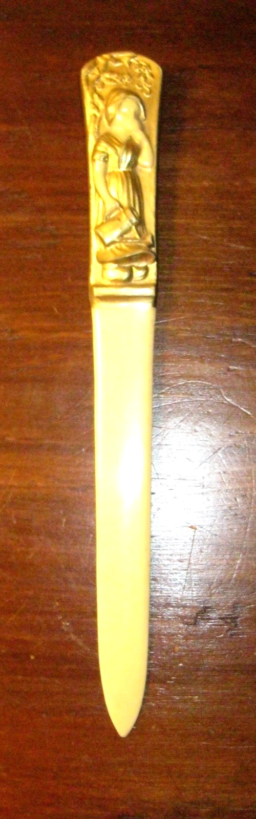 Antique Celluloid Letter Opener Girl Watering Flowers in Relief Gilded 7 5/8"L Antique Celluloid Letter Opener Girl Watering Flowers in Relief Gilded 7 5/8"L
